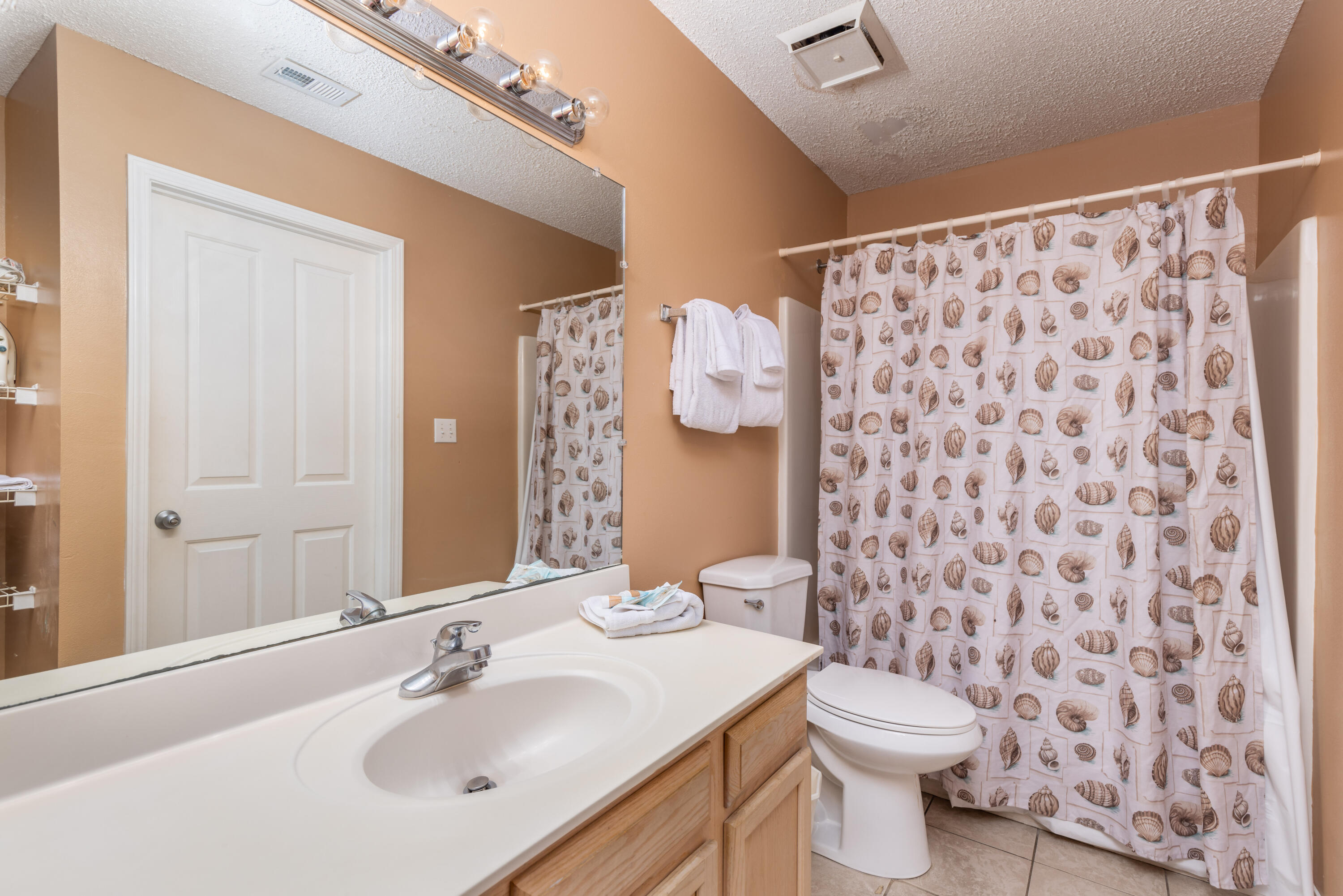 GRAND CARIBBEAN EAST CONDO UNIT 207 - Residential