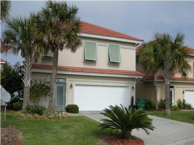 Unfurnished, Mediterranean - style home for rent! Located in the beautiful Calusa Bay subdivision, this home features an open living / dining area with travertine tile flooring and crown molding throughout. Kitchen boasts of solid wood cabinets in kitchen, tile backsplash, and stainless steel appliances. House features a tiled and fenced patio and two a/c units. Master suite features his and her walk-in closets and private balcony. Master bathroom contains a marble double vanity and a whirlpool tub! Separate laundry room located upstairs. Community pool and golf course. NO SMOKING.