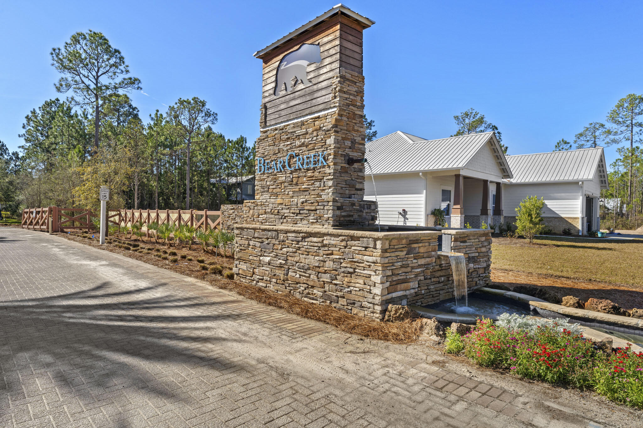Spectacular building lot in the gated subdivision of Bear Creek - the perfect place to build your new primary or secondary home! Located just minutes from the white sands and emerald waters of the Gulf, this 68' x 180' lot affords ample room to build a spacious home plus a private pool and carriage house, if desired. Bear Creek features a variety of amenities for owner's of every generation to enjoy, including a community pool, playground, tennis courts, basketball and pickleball courts. The immediate area offers a wealth of shopping, dining and other recreation, such as fishing, hunting and golf. Come live your best life now! No wetlands + Flood Zone 'X'. Owner financing available.