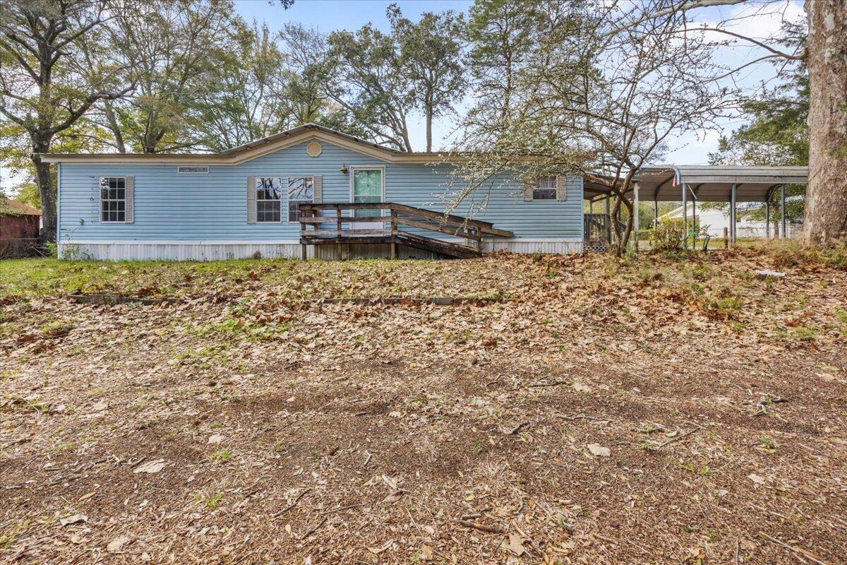 This .88 acre property is a true find in a quaint neighborhood. The sale includes two parcels along with a 1997 double-wide manufactured home offering 3 bedrooms, 2 baths, and 2 sitting rooms fully livable with utilities and septic already in place. Looking to build? With City approval, the property has the potential to be subdivided into multiple buildable lots, opening the door to endless possibilities. With no HOA and no restrictions, you'll enjoy freedom and flexibility to make it your own. Conveniently located just minutes from Eglin AFB, Hurlburt Field, and Duke Field, and only 15 minutes to the world-famous white-sand beaches of the Emerald Coast, this property combines location, opportunity, and value in one package.