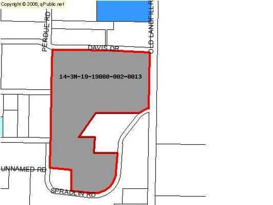 This great +/- 40 acres parcel fronts on 3 maintained roads. There are some nice large trees on this parcel and a creek. This parcel is located very close to town and on a paved road. Have everything you wanted with this larger parcel close to town. Owner has had a recent survey of the acreage. There is a wood sided manufactured home on the property that was used as a rental for years. It will need renovating and cleaned up, but could be livable with a little TLC. Less than a mile from the City Limits, this place could be a great place to build a new home or update what is there. Also listed under detached single family - mls#590458.