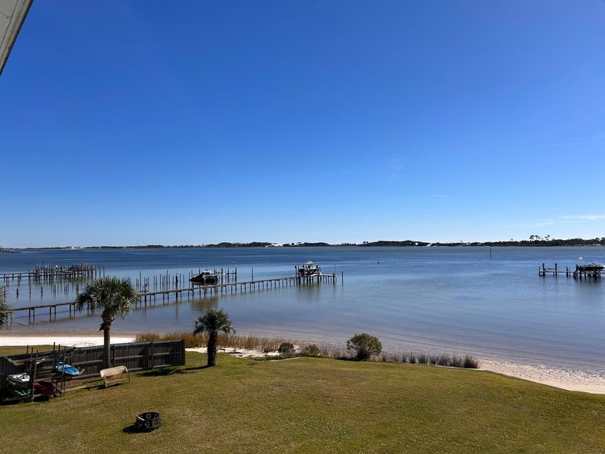 Waterfront Living at Its Best - Ideal for Boat Owners! This exceptional waterfront condo offers the perfect lifestyle for boaters and water enthusiasts. With breathtaking sunset views over the Sound and direct access to the water, you can dock your boat or jet skis right at the condo's private dock. This spacious, updated three-bedroom, two-bathroom condo is just a short drive from Eglin AFB (10 miles) and Hurlburt Field (2 miles), making it a convenient location for work and play. The condo has been impeccably maintained, featuring an updated kitchen with white cabinetry, stainless steel appliances, and tile flooring throughout the main living areas. A private 24-foot covered balcony is ideal for enjoying the views and coastal breezes. With a brand-new HVAC system installed in 2024, and built-in hurricane shutters for storm protection, this condo is both comfortable and secure. The living room and master bedroom each have sliding glass doors that open to the expansive balcony, providing you with seamless indoor-outdoor living and stunning views right from your doorstep.

The master suite is a true retreat, complete with a large walk-in closet, dual vanities, and a private shower. The condo also offers long-term rental potential (6+ months), and owners' pets are welcome.

The HOA fee includes dock, exterior maintenance. The condo provides one assigned parking spot, with additional guest parking available. Whether looking for a permanent residence or a getaway for your boat-loving lifestyle, this waterfront condo has it all.

Don't miss the opportunity to own this waterfront gem - schedule your showing today and start living the coastal life you've always imagined!