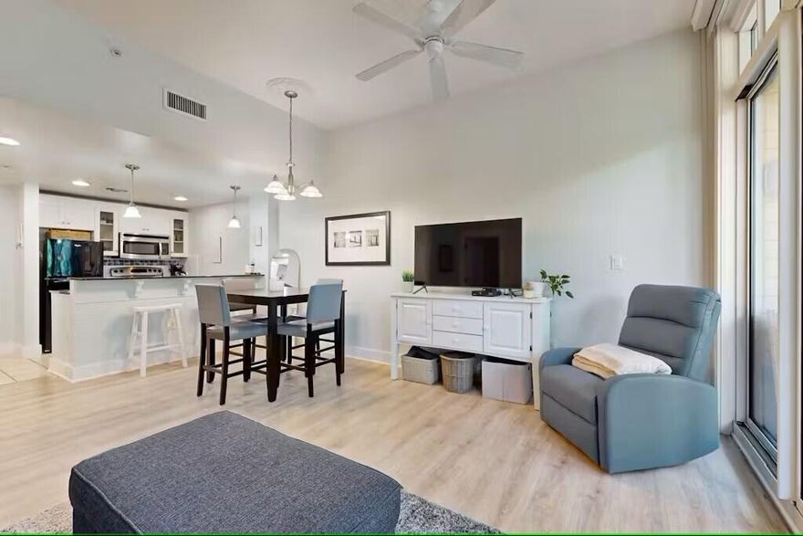This top floor, one bedroom, one bathroom is beautifully updated, has ten-foot-high ceilings with a full kitchen, in unit laundry (washer and dryer) and is located in the heart of The Village of Baytowne Wharf within Sandestin Golf and Beach Resort! Where all the fun and excitement of resort vacationing comes to life.

Recent upgrades include all new furniture, including a king-sized Sealy Posturepedic mattress, new pullout couch with queen sized gel and memory foam hybrid mattress, a comfortable recliner, new smart televisions, the entire unit has a fresh coat of paint, new fans, and lighting throughout, and blackout roller shades.  Comes with one private parking space in the second-floor garage.  Owner pays for internet, basic cable, water, sewer, garbage, and homeowner association fees.  Tenant is responsible for electricity bill.  

Located on the fifth (top) floor conveniently next to the elevator, you are a short elevator ride away to restaurants, Sundries General Market (grocery/convenience store), live music, shopping, restaurants, entertainment, seasonal festivals, fireworks, drone shows, movies and more! Enjoy the community pool and hot tub or burn up a sweat in the exercise room and then turn up the heat on one of the outdoor barbeque grills.

You are a short ride away from one of Florida's finest beaches, which has gorgeous white sugar sand and clear water on the Emerald Coast!

Enjoy the very best of Sandestin's Village of Baytowne Wharf at your doorstep! This beachy one-bedroom apartment comfortably sleeps four (4) and has a quiet coastal vibe. Located in Observation North, this unit offers all the fun and excitement of the Village as it is located in the center of it all. It has a spacious and private balcony, which is great for entertaining.
Sandestin Golf and Beach Resort encompasses over 2,400 acres with four golf courses, world-class tennis and pickleball center, walking/biking paths, and a world-famous beach. The Village of Baytowne Wharf has everything you need from a general market/convenience store to shops, restaurants, and exciting nightlife. You will never have to leave the property, no need for a rental car. If you do leave the property you are located near all of the best activities Miramar Beach has to offer--fishing, a visit to Crab Island, and so much more!

After preparing a delicious meal in the full kitchen, serve your dinner guests at the dining table with seating for four.
You can enjoy a quick afternoon snack at the breakfast bar with seating for two, before heading out for a day on the beach. Don't forget to use the free Wi-Fi to research a fun new adventure or post your best selfies on your social media. There's nothing like a refreshing swim in the shared pool after a hot-weather hike or a game of tennis on the shared court, and the hot tub is a great way to wrap up an evening with friends. Golfers will be in a veritable paradise, with three onsite golf courses to choose from. When it's time to call it a night, you'll have a luxurious king-size bed to get a long and rejuvenating sleep in!