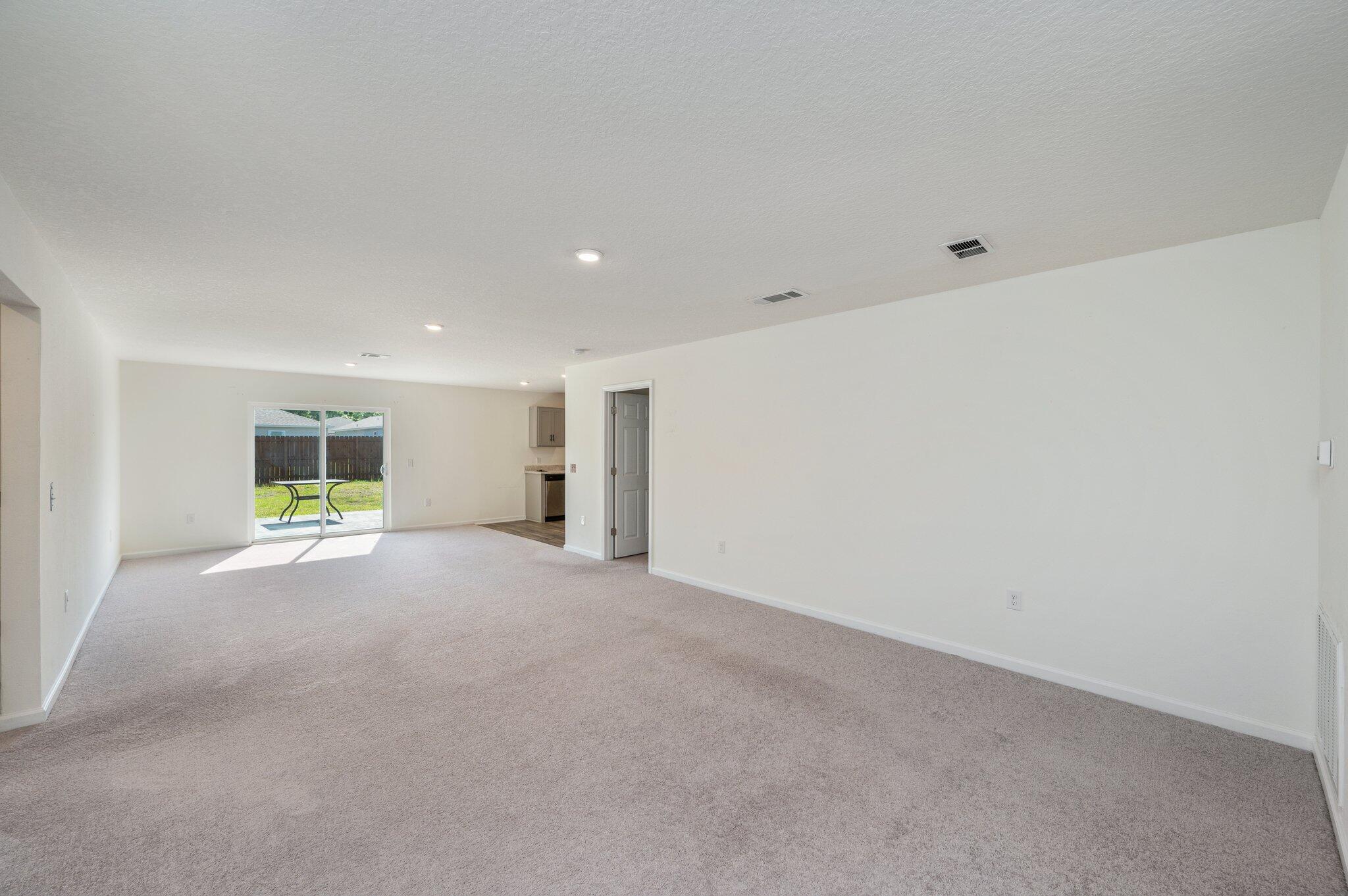 Welcome home to this beautifully maintained practically new build that offers even more upgrades and space to enjoy! Step inside to find a spacious living room with tall ceilings, perfect for entertaining guests or relaxing after a long day. The split floor plan provides privacy, while the like-new flooring and blinds add a modern touch throughout. The stylish and functional kitchen is designed to impress- featuring sleek stainless steel appliances, ample counter space, a generous pantry, and modern finishes that make cooking and entertaining effortless. The spacious laundry room adds convenience, and each bedroom is generously sized for maximum comfort. Outside, you'll love the partially fenced, flat yard and the huge back patio slab, an $8,000 upgrade added--perfect for outdoor gatherings, grilling, or enjoying your morning coffee.
Don't miss this opportunity to own a move-in-ready home with all the perks of a new build and more. Schedule your showing today