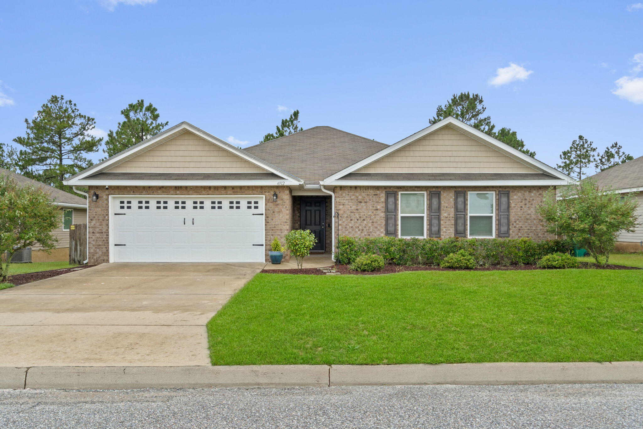 Welcome to 4912 Kensington Lane -- a well-maintained 4-bedroom, 2-bathroom home in Crestview's established Partridge Hills neighborhood. Built in 2018, this home offers over 2,200 sq ft of living space with a thoughtfully designed split-bedroom layout and open-concept living areas.The kitchen features a center island, breakfast bar, pantry, and updated appliances, flowing seamlessly into the main living area. You'll also find custom built-in shelving, perfect for display or added storage. The spacious primary suite includes a walk-in closet and private ensuite bath with double vanity. SELLER is now letting Washer and Dryer to be included in the sale !!!Step outside to a covered patio and fully fenced backyard--ideal for relaxing, entertaining, or creating a personal outdoor retreat. A whole-home water purification system is already in place for added peace of mind.
Conveniently located to schools, shopping, and major roadways, this home also offers direct access to Florida's scenic Gulf Coast, including Destin, Okaloosa Island, and many other beach destinations.