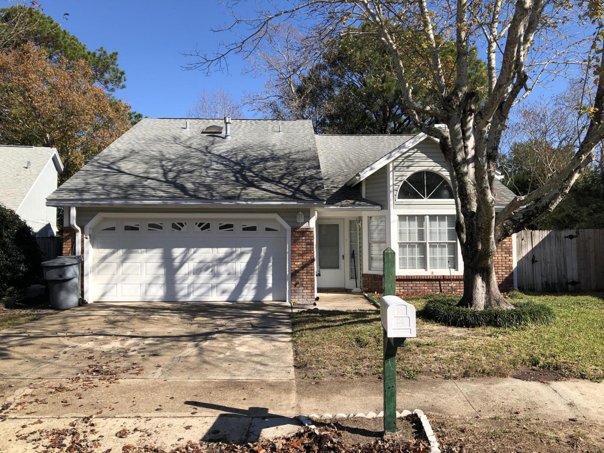REMODELED. 4 BR's. Master Suite is downstairs. Huge BR upstairs w/2 large closets & 1/2 bath. Large LR/DR w/wood burning Fireplace & mantle. New Kitchen w/soft closing drawers/doors,new stainless appliances, granite top. Inside Laundry Room. 2 Car Garage. 10'x10' covered patio + 10'x15' concrete patio + vinyl shed. Auto Sprinkler Sys. Gas heat & water heater. New flooring & wide baseboards. New 2 panel interior doors & hardware. Walls freshly repainted. New ceiling fixtures & air registers. New vanities bathroom vanities with solid surface tops. New outlets & switches in white color to match the new doors and trim. New carpet in BR's and LR area. All other areas has new Luxury Waterproof Vinyl Plank flooring. Underground utilities. Popular sidewalk neighborhood. Great location!