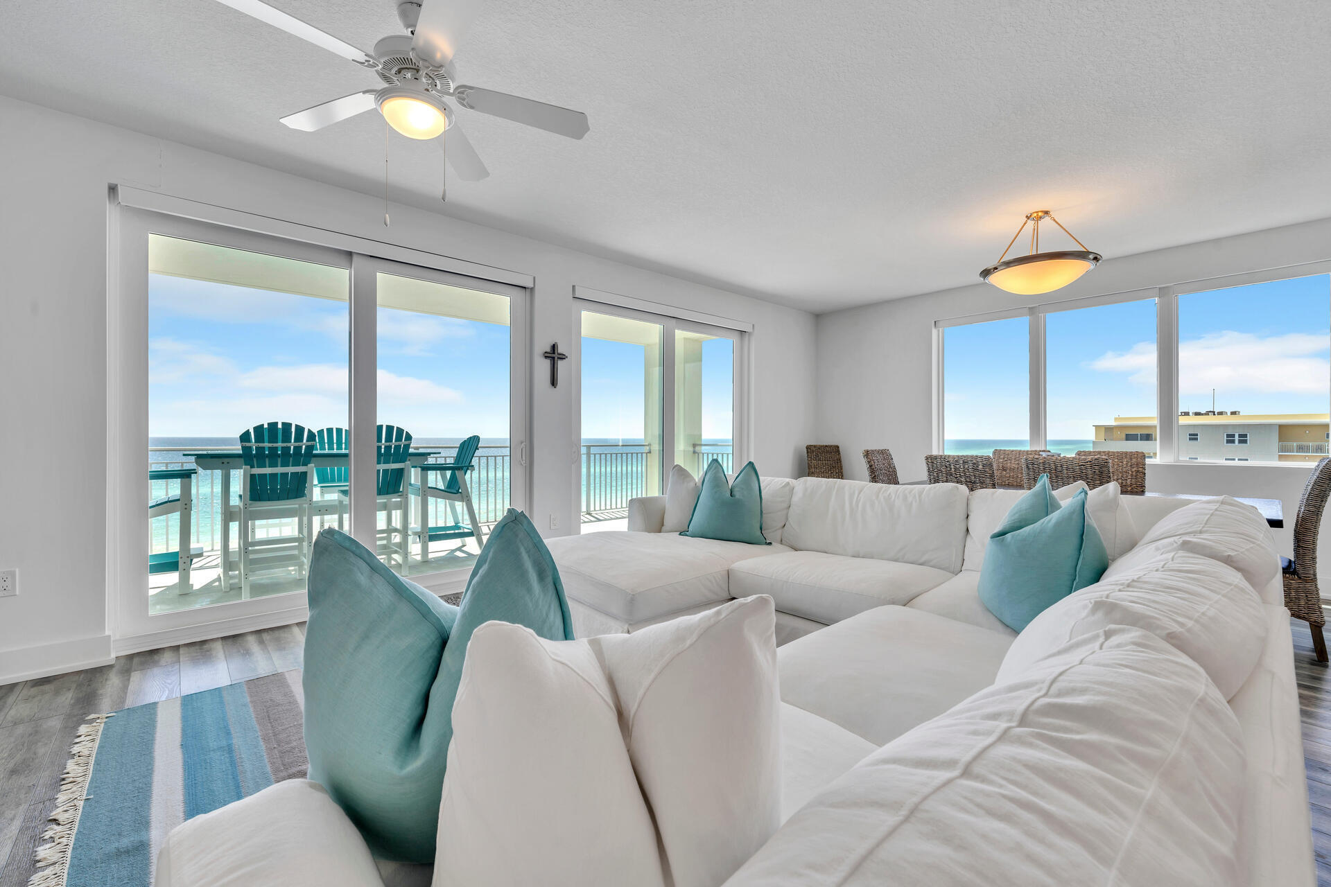 JUST REDUCED! You've found it! The BEST of the BEST! LIKE NEW! Premier W end sun drenched PENTHOUSE- 607 Blu! Enjoy sunsets & sparkling aqua Gulf waters across 180 views. LR, DR, Kitchen, MBR - FL to ceiling glass allow flowing natural light! From the OK Island pier to the shores of Navarre. Immaculate interior in like NEW condition-sold furn. in delightfully modern decor in a coastal cool palette of turquoise, whites & greys. 1st class upgrades; custom cabinets in Mbath & laundry, upgraded tilework & appliances. Impressive! Private covered designated parking #140 w/storage cage #46. Rare 4br/3ba condo. Amenities: low density 47 units; gated entry, 313' gulf beaches, 2 zero edge pools 1 heated, firepit, hot tub, grills, fitness & more! $150+K Projected Rental Income. A MUST SEE-EASY SHOW!