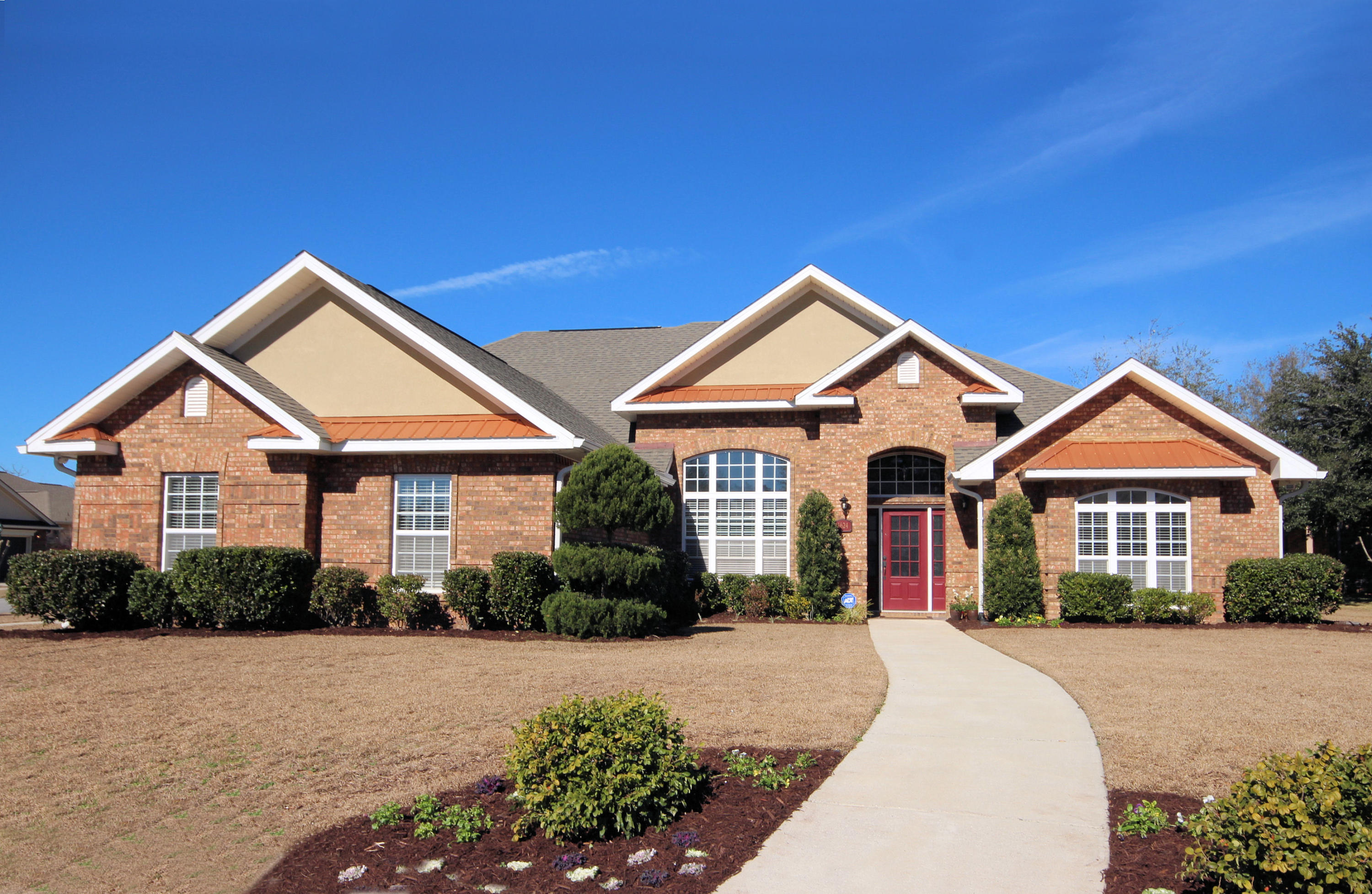 GORGEOUS ONE OF A KIND CUSTOM HOME !!! This Custom home is all you could want it to be and MORE. Be sure to look at the pictures to see the Spectacular Cypress tongue and groove Coffered Ceilings (10 to 17 feet high).Hardwood flooring in Living, Formal Dining room, Office, Hall & 1/2 bath. Large Eat-in Kitchen with gorgeous solid Maple Cabinets and Stunning Granite countertops, built-in cabinets with glass doors in breakfast area. Very Large Master bdrm and Bath with Walk in Closets whirlpool tub, separate shower, double sinks, wall mounted TV & room to dance! The extra Family room is just off the Kitchen/Breakfast area and is large and plenty of room. The private Wet Bar is between the Master bdrm and the Office. There are three other bdrms which boast Large Closets and adjoining Baths.