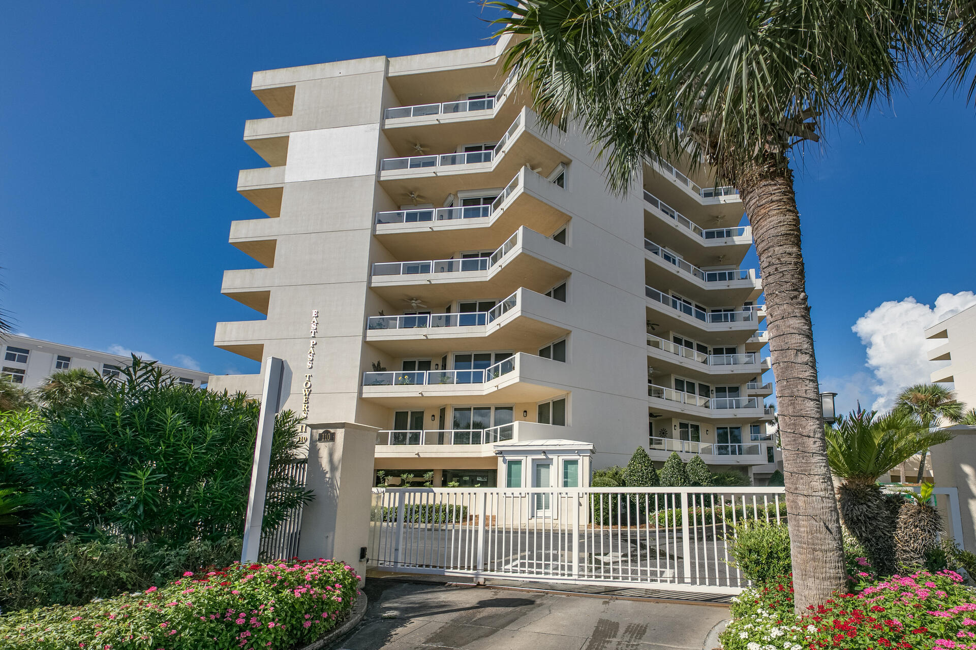 This is a remarkable floor plan with 2 entrances.There are only 3 of this floor plan in the building. This spacious unit has a walk-in closet in master bedroom and very large master bath. At the other side of the unit, there are 2 spacious bedrooms with their own bathrooms. At the back entrance close to the elevators, is a large laundry room for all the beach towels.If you are into entertaining, this is definitively for you. There is a very large serving area in the kitchen area with lots of storage underneath. There is a wet bar as you enter. Each room featrures floor to ceiling doors and windows which allows the views of the harbor and pass. This unit comes furnished only excluding a few personal items.There are only 5 enclosed garages and one belongs to this unit. Must see!!