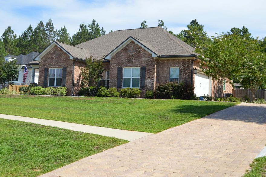 Check out this Oasis made for relaxing and creating your own adventure. This Custom Built home has it all. 4 bedroom 2 bath split floor plan design complete with open concept great room and interior utility room. As you enter the large foyer you have a view of the great room and through to the back yard pool. Home has hickory Hard wood throughout. The Kitchen has a large Island with breakfast bar, sleek black appliances and granite countertops. The Great room allows you to arrange your furniture in multiple ways to include your dining table. Bedrooms are large as well is the Oversized garage. Master bedroom has views of the lanai, with an oversized ensuite and walk in closet complete with built-ins.