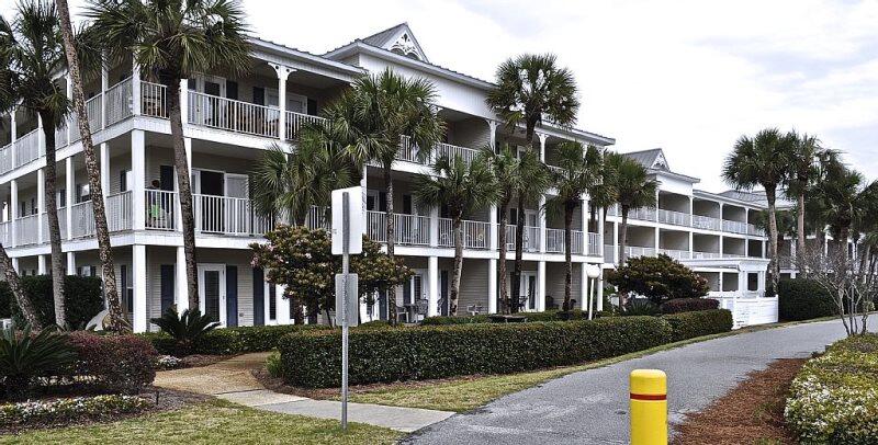 Open up the double doors to the balcony and enjoy Emerald Coast views from the living room and kitchen. Corner unit with oversized balcony directly across from beach access.  Grand Caribbean East is a small complex that has a well maintained pool and bbq pit area. The area is family friendly and near several restaurants such as Camille's, The Crab Trap, Capt. Dave's and others.  The condo sleeps 6 with a king in the master bedroom, queen in second bedroom and integrated new twin bunks in the hallway, plus a sleeper sofa.  Rental income average is $27,000-$30,000. New paint and LVP flooring updated last season.  Tile in kitchen and bathrooms. Step out the door to enjoy walking or biking on Scenic Gulf Drive with easy access to restaurants and shopping.