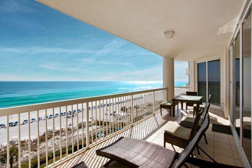 This 7th floor unit has stunning views of the Gulf, and good rental income.  Tastefully decorated, with remodeled kitchen, nice furniture, and very large deck overlooking the Gulf and the pool to the west.   Granite countertops, and stainless appliances in the kitchen, this unit is being sold turn key and rental ready.   Open living, dining, and kitchen concept, with laundry room off kitchen.  This unit includes a deeded parking space #233, and there is plenty of parking all around the complex.   Floor to ceiling windows give enormous views in the living area, and master bedroom of the Gulf.    Numerous balcony, deck access from living room and bedrooms.  Very nice condition.