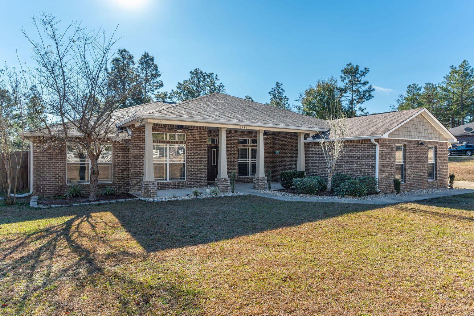 Spacious and serene! This 4BR/3BA brick beauty in Yellow River Plantation offers 2,732 sq ft of comfortable living on 1.2 acres. Enjoy an open floor plan with formal dining, office, and bright living area. The kitchen shines with abundant cabinetry, granite counters, and a pantry. Private primary suite features a walk-in closet, dual vanities, soaking tub, and separate shower. Three guest rooms and three full baths provide flexibility for family or visitors. The expansive yard is perfect for gardening, or outdoor entertaining. There is a parking pad for a boat or RV. Yellow River Plantation is known for its large lots, just minutes to schools, shopping, and conveniences. Country living close to it all!