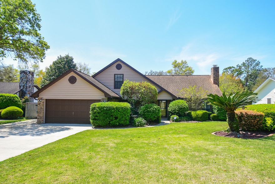 Completely remodeled.  This incredible 4 bedroom 3 bath home is ready for immediate occupancy.  Large living room with gas fireplace and formal dining room with updated flooring and lighting.  The kitchen has new flooring, new custom cabinets, lighting, granite counter tops, large sink with breakfast bar.  The master bedroom has been enlarged, dual sink master bath, with custom closet.  Roof is 15 yrs old and A/C system is approximately 5 years old.  The sellers have also added a 20x40 Sport Pool, with expanded patio and deck area and pool enclosure.  The pool area is complimented with a bar area with TV and storage.  Brick and hardi board on the exterior, complimented with well maintained landscaping.  Custom windows with blinds were also added on the back of the home