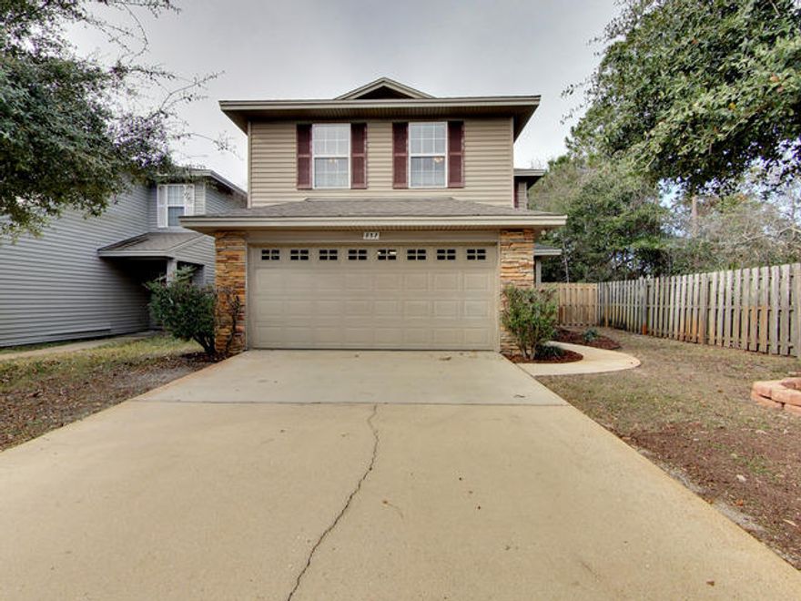 CHECK OUT THE VIRTUAL TOUR ALSO! Take a look at this beautiful home with huge rooms for all. The downstairs area is open and inviting with carpet and vinyl flooring. This is a step saver kitchen without the crowded feeling. Home does have washer and dryer that convey as is. The garage is finished and provides plenty of room for two cars. The upstairs is inviting with a huge family area hat could be utilized as a bedroom if needed but opened to all additional bedrooms and full bathroom. The huge master bedroom includes walkin closet and well thought out master bathroom with garden tub and shower. All upstairs rooms include carpet and raised panel colonial doors. Faux wood blinds in all windows. THIS DEMAND LOCATION MAKES FAST ACTION A MUST!