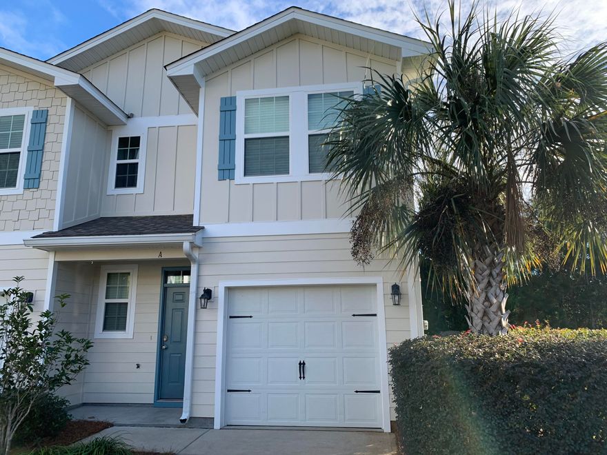 This 3 bed/2.5 bath end unit boasts an open floor plan with the main living areas downstairs, access to a back porch, raised ceilings and crown molding. Tile floor throughout the first floor and there is a half bath. The kitchen features granite countertops, stainless steel appliances, beautiful wood cabinetry and ample storage with the pantry. The upper level encompasses all 3 bedrooms including a spacious master bedroom with a walk-in closet and en-suite bathroom featuring a double vanity and granite countertops. Two more bedrooms share an additional bath also with granite countertops. The one-car garage includes an added storage system. This beautiful home also includes solar panels for a much cheaper electric bill whole home water filtration system with reverse osmosis!