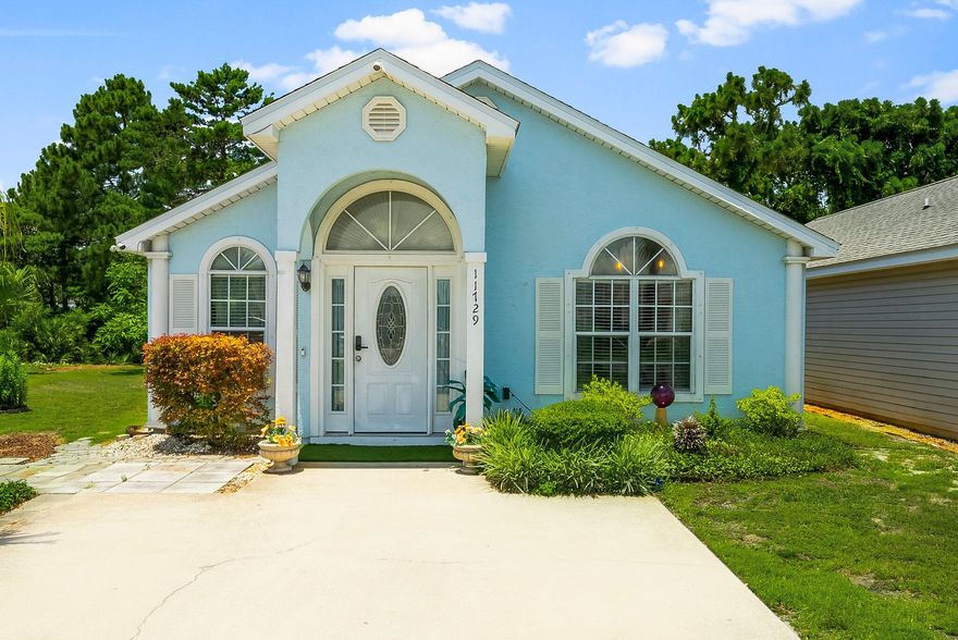 UNDER CONTRACT WITH CONTINGENCIES; SELLER ACCEPTING BACKUP OFFERS. Turn-Key, Fully Furnished 3BR/2BA Coastal Retreat - Ideal for Short-Term Rental or Primary ResidenceWelcome to this beautifully maintained and fully furnished 3-bedroom, 2-bathroom home, perfectly positioned just minutes from Panama City Beach's sugar-white sands, shopping, dining, entertainment, and Shipwreck Island Water Park just a short walk away. Whether you're looking for a primary residence, second home, or investment opportunity, this move-in-ready property offers both comfort and convenience.Located in a gated community with amenities that include two pools, a playground, and included trash and grounds maintenance, this home sits on an oversized lot backing to a tranquil wooded area for added privacy. Inside, an open-concept layout features tile flooring throughout the main living areas and luxury vinyl plank flooring in the bedrooms. Vaulted ceilings enhance the spacious feel, while the updated kitchen boasts granite countertops, stainless steel appliances, tile backsplash, and a stone-accented breakfast bar.
The primary suite and a secondary bedroom offer direct access to the enclosed back porchideal for relaxing with morning coffee or evening wine. Step outside to your own private oasis, complete with cobblestone pavers, lush landscaping, and a koi pondperfect for peaceful enjoyment or entertaining guests.
Don't miss your chance to own this thoughtfully upgraded, turnkey property in a prime beachside location.