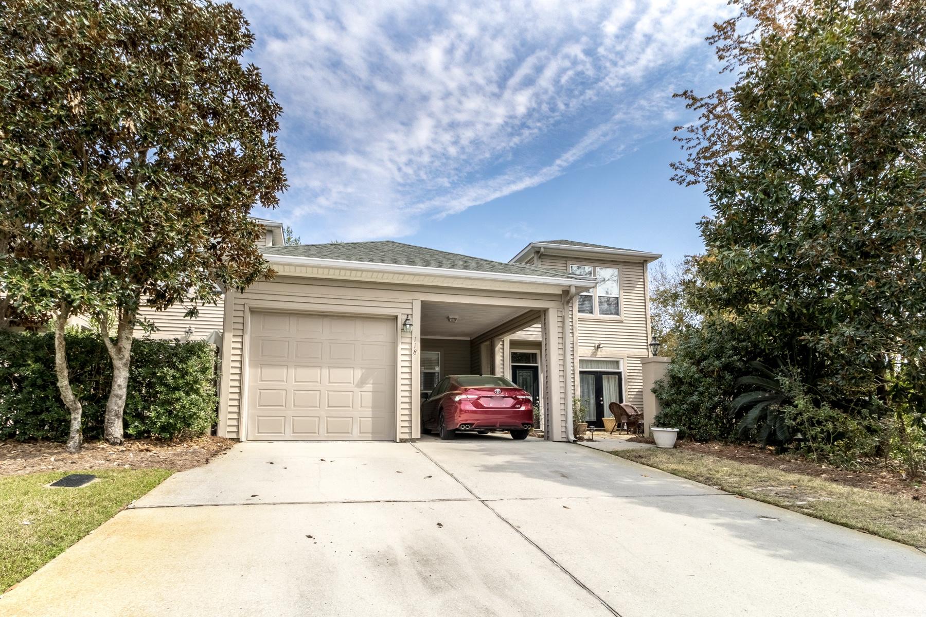 NEW PRICE!! One of the most sought after neighborhoods just off Scenic 30-A. Walk or bicycle to the public beach access. Santa Rosa Golf Club is just across the road. The Courtyards is a 44 home community with a community pool! The courtyard at the front of the home makes a welcoming statement. The living room is large enough to entertain a large party or family gathering. Open concept dining area has French doors leading out to the large, enclosed screened porch with a stone floor. Featuring two bedrooms and two and a half baths on the first floor and the third bedroom/office/studio and bath on the second level.