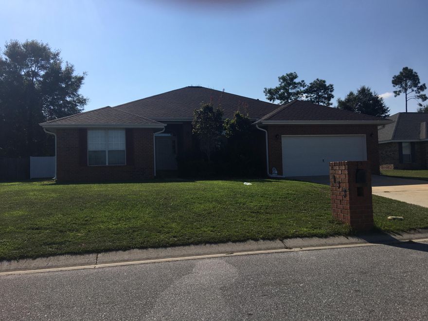 Very well maintained 4 bedroom/2 bath home in the South end of Crestview. Walk into the tiled foyer to a large open living area with a wood burning fire place and laminate wood flooring. The large kitchen has tile flooring, lots of cabinet space, and a separate pantry. Enjoy the split bedroom floor plan with a garden tub, separate shower, and double vanity in the master bath. Walk out to the large fenced in backyard with an open patio.