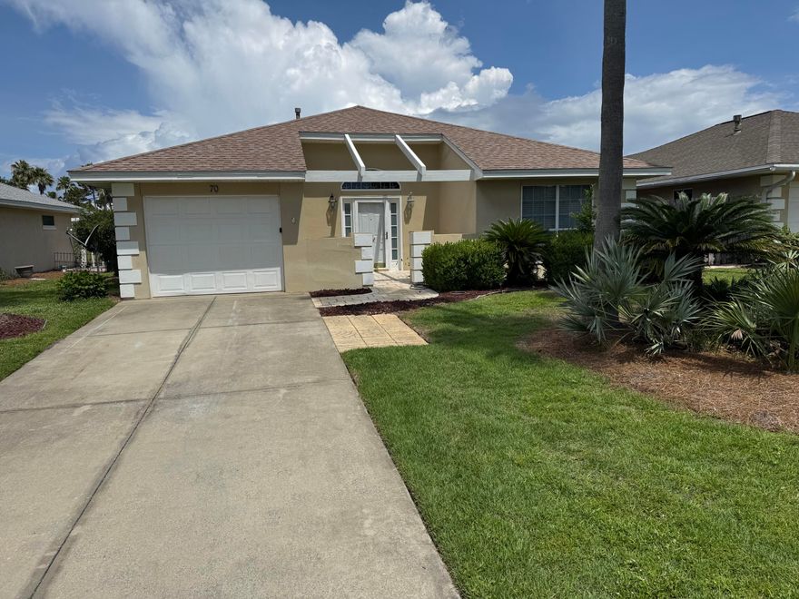 Don't miss this!Bayside is a quiet comfortable bay front neighborhood close to shopping, dining and Beach!  Community amenities include a bayside gazebo and community dock for fishing, relaxing, or viewing the next sunset.  You also can enjoy the pool, playground, tennis court and community gathering room.   This home features an open spacious floorplan with split bedrooms for privacy, vaulted ceilings, gas fireplace and a spacious heated and cooled Florida room that could be converted to 3rd bedroom or office.  The HOA fees covers your lawn maintenance tree trimming.