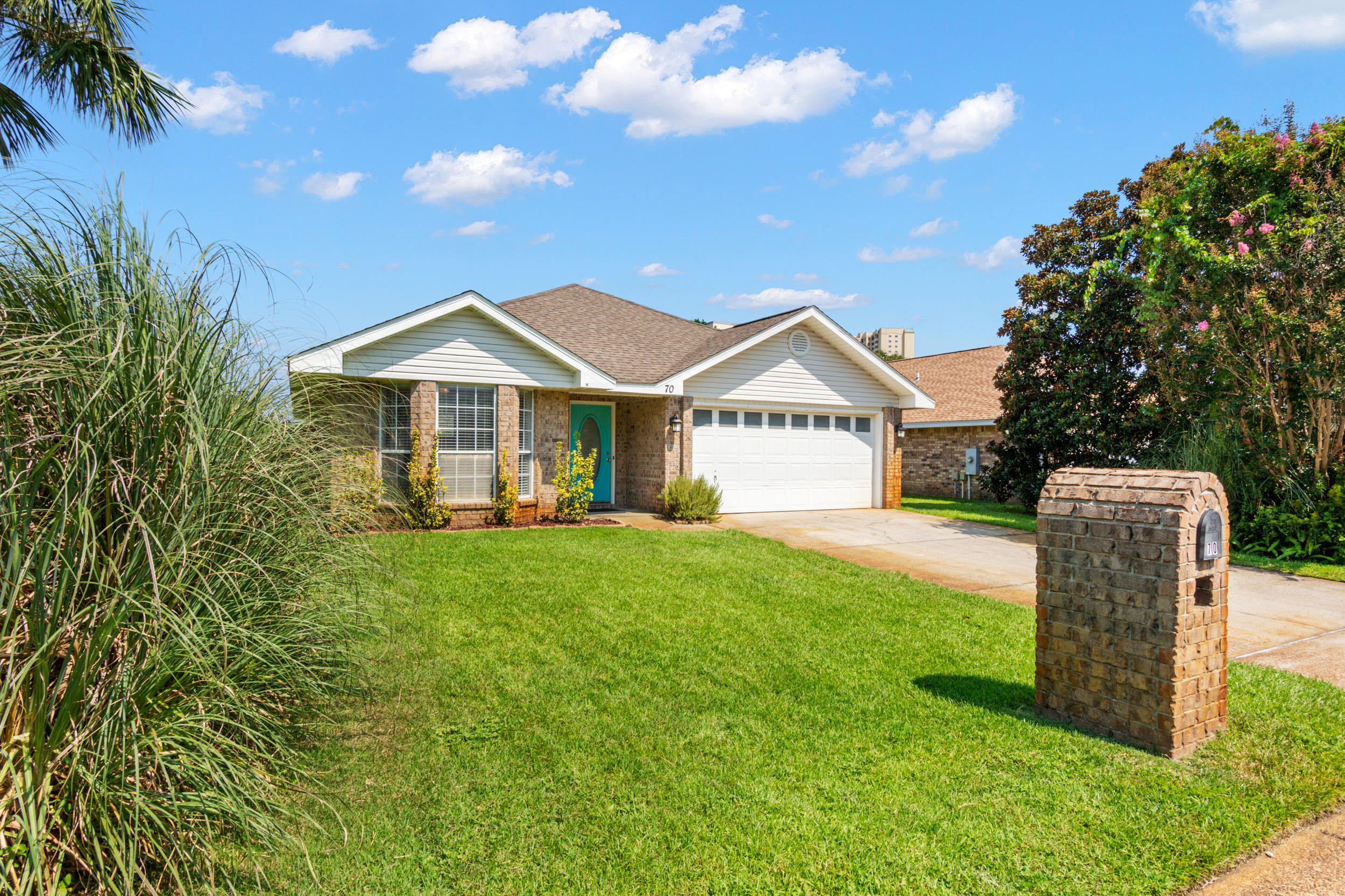 This coastal beach home sits tucked away in the quaint community of Seaspray, a cozy and quiet neighborhood ideally located less than half a mile from the beautiful emerald waters of the Gulf of Mexico. Presenting an incredible investment opportunity with several years of proven rental history, this home has grossed over $75k year to date in base rental rate, and is offered fully furnished as a turnkey, rental-ready home. Designed with coastal finishes and decor, this 1-level brick home features a split floor plan, complete with 3 bedrooms and 2 full baths, and a bonus bunk room for additional sleeping arrangements. The oversized maser suite features a separate garden tub and shower, and a walk-in closet. Outdoor activities abound with a private pool