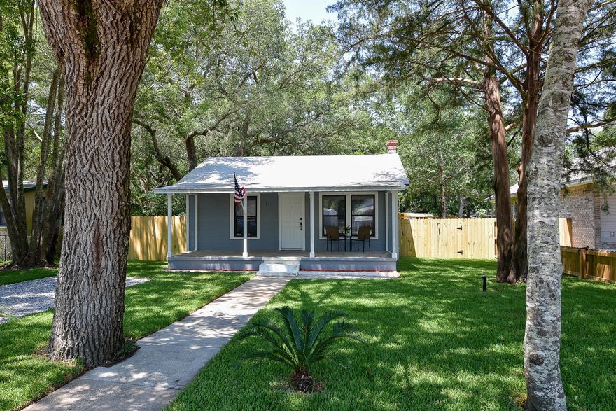 Adorable 2 bedroom and 1 bathroom Florida cottage for sale on a large lot in Niceville. The covered porch is very inviting and is a great place to enjoy your morning coffee. The kitchen features cherry cabinets, neutral countertops and stainless steel appliances, and is open to the living room with lots of windows offering plenty of natural lighting and new laminate floors. The large backyard provides for plenty of entertaining space or even room for a detached garage or pool. This home has recently been renovated and is move-in ready. Come and see for yourself! Lawn pump is not functioning properly and will be sold as-is.