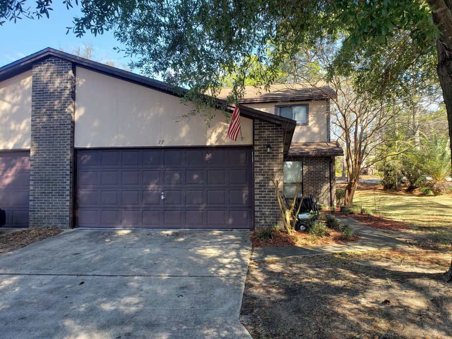 Great location in Valparaiso. corner unit with florida room . hard wood floors. master bed downstairs