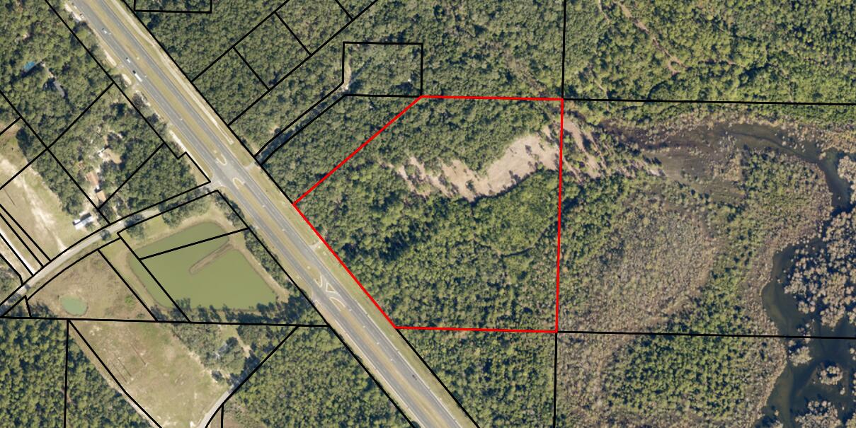 2 different parcels being sold together15.73 acres plus 26.93 acres. approximately 12 acres high and dry on hwy 87 and the rest is dry but considered wetlands and butts up to dead river that leads to yellow river. ***Please do not go on property without permission from Real Estate AgentProperty is under surveillance***