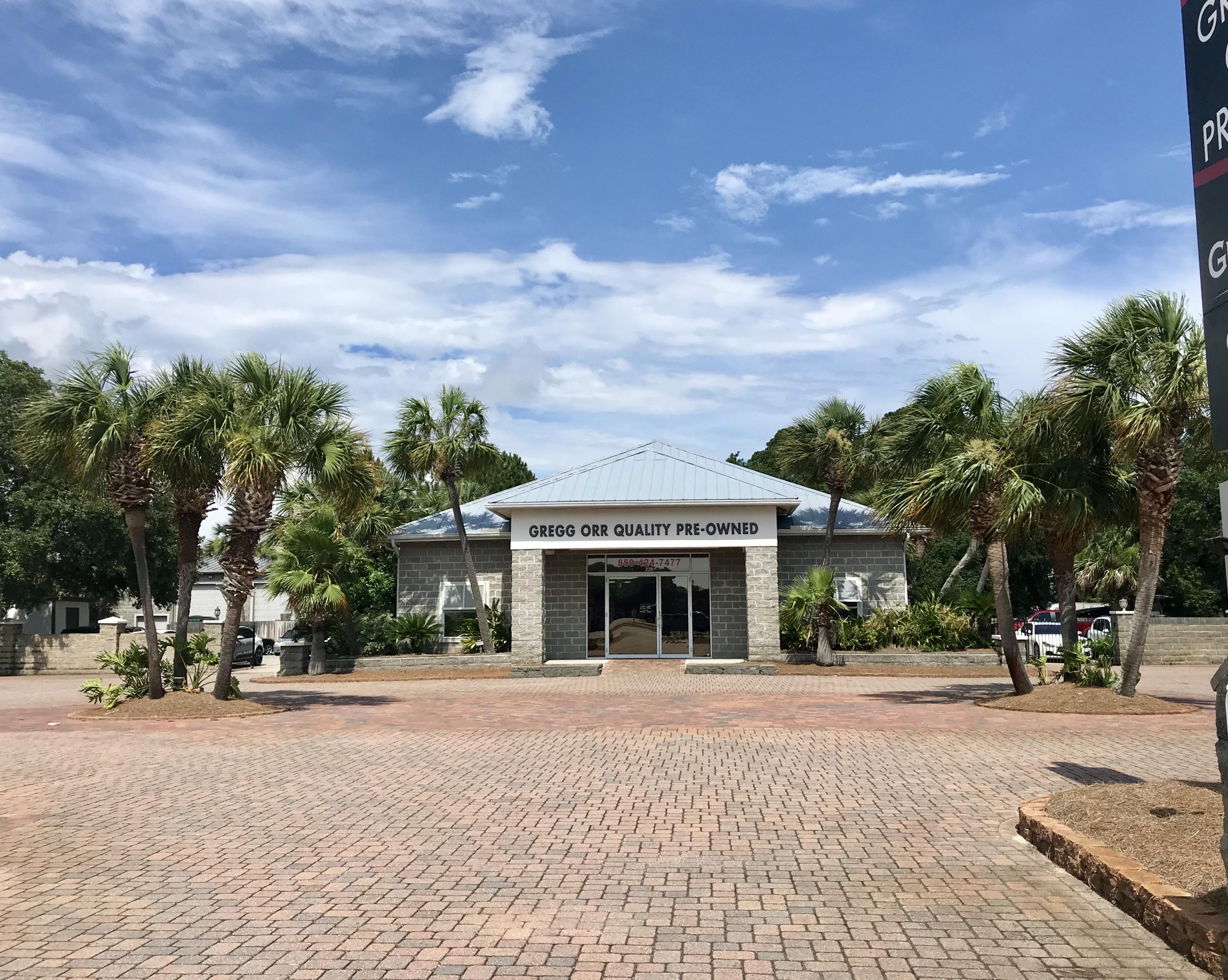 Destin is growing and thriving. Priced well below current appraisal this property was previously used as car dealership and is ready for another successful dealer or other retail service. This building is 2,496 of total area with 1,660 in office/showroom and about 800 sq ft of shop space. Consisting of showroom, reception area, multiple offices, ample storage, full bathroom, drive in service bay with overhead door, and large concrete parking area surrounding the building. Located in the heart of Destin near various retail stores and restaurants. Come be part of Destin's Town Center Community Redevelopment Area.