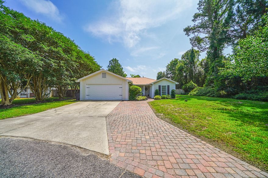 Live the 30A lifestyle at an affordable price! This beautiful 3 bedroom, 2 bath home in the heart of Santa Rosa Beach is minutes from 30A and would make the perfect primary or second home! Head to the beach or enjoy Florida living on the covered porch or in the huge fenced-in yard. No HOA! This home features a split floorplan and lives like a much larger house. The spacious master suite has a garden tub and two closets! Additional features include large guest rooms, eat-in kitchen, fireplace, laminate flooring, and two car garage. Schedule a tour today; this one won't last! Buyer should verify all information, including room sizes.