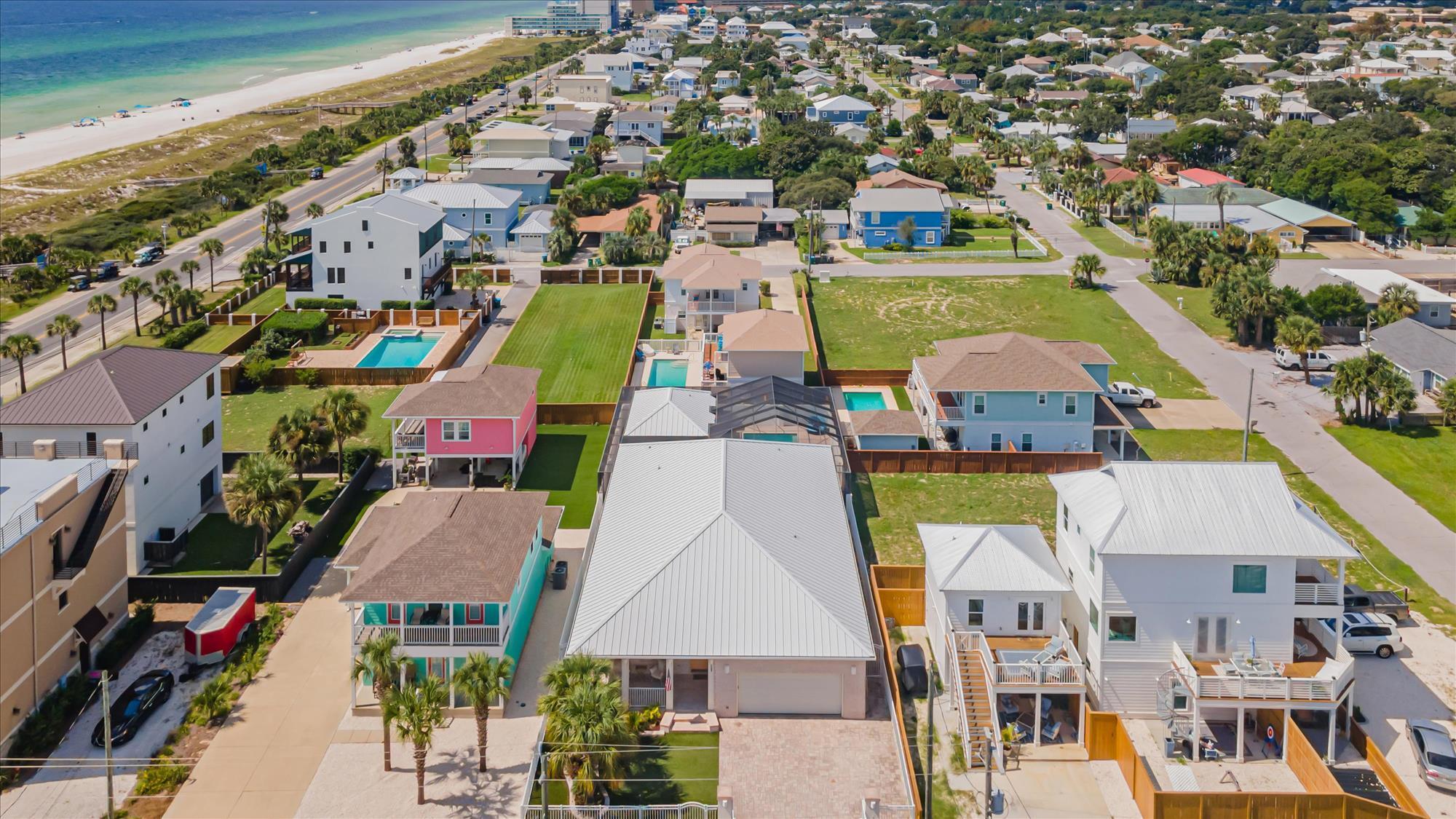 INSTANT EQUITY! Home appraised for $1.5 million last week. A must see beach property! Nestled in the heart of Panama City Beach, step inside this exquisite beach residence that offers a lifestyle of unparalleled sophistication and serenity. Boasting a prime location with direct access to the pristine sands, this stunning pool home is a true oasis. Once you step inside you are greeted by a gourmet chef's kitchen, designed to impress with high-end appliances and elegant finishes; along with custom cabinets, bamboo and tile flooring, wet bar, inlaid ceilings, fine wood finishes, and more. The spacious living areas are bathed in natural light, creating a warm and inviting atmosphere. Indulge in the luxury of a fully screened in private pool, perfect for entertaining guests or simply r Boasting a prime location with direct access to the pristine sands, this stunning pool home is a true oasis. To add to the pristine residence, an additional 470 sqft. 1 bedroom detached pool house or mother-in-law suite with kitchen and full bathroom are sure to please any guests and add to the excitement while living the beach life.
Enjoy the convenience of private beach access, just steps from your doorstep. With the only private beach access in Panama City Beach, Bid-A-Wee subdivision offers 5 gated beach accesses for the community use.
Recent Upgrades:
Artificial Turf front and back of home.
Freshly painted interior.
New AC Units in the main and pool house.
New ceiling fans replaced on front and back patios.
New ceiling fans and lighting fixtures in the living room, dining and master bedroom.
Upgraded pool equipment.
Garage floor epoxied.
This exceptional property offers the perfect blend of luxury, comfort, and convenience. Don't miss this opportunity to own your dream home in one of the most desirable locations in Panama City Beach!