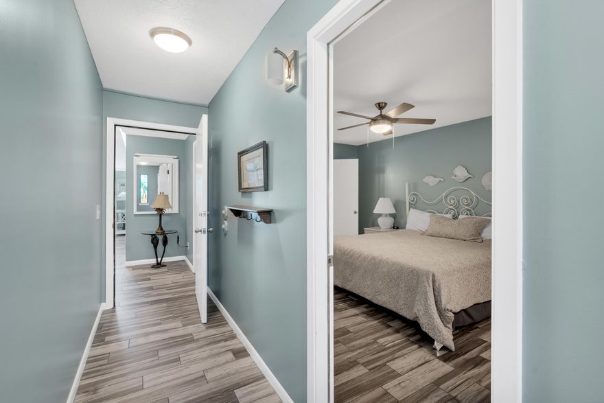 $5,000 CLOSING CREDIT!! Nearly $43K ACTUAL rental income in 2024! Discover your Gulf-Front Paradise in this spacious condo that SLEEPS 8! This 2 bedroom, 2 bath condo in Panama City Beach is the perfect beach retreat you've been dreaming of. Located in the low density, 30-unit complex of Whispering Seas, you'll be escaping the crowds! At a spacious 1,256 square feet, this condo is a great value compared to other properties in the area. It is impressively furnished to comfortably sleep 8 guests, making it an ideal vacation rental investment property. The layout and size of this condo rival that of a three-bedroom unit, providing plenty of space for everyone to relax and enjoy. NEW Refrigerator, hurricane resistant sliding doors and mattresses just replaced! The living room is a perfect place to unwind after a day in the sun and features breathtaking Gulf views and a sleeper sofa to accommodate guests. The two bedrooms are both generously sized with a king bed in the master suite and two queens in the second bedroom. You'll have stunning Gulf and palm tree views from the balcony! Whispering Seas offers amenities for both residents and guests to enjoy. Take a refreshing dip in the beachfront community pool, lounge in the sun or grill-out on the Gulf-Front Terrace. Don't miss out on this incredible opportunity to own a beachfront condo in Panama City Beach at a great value.
