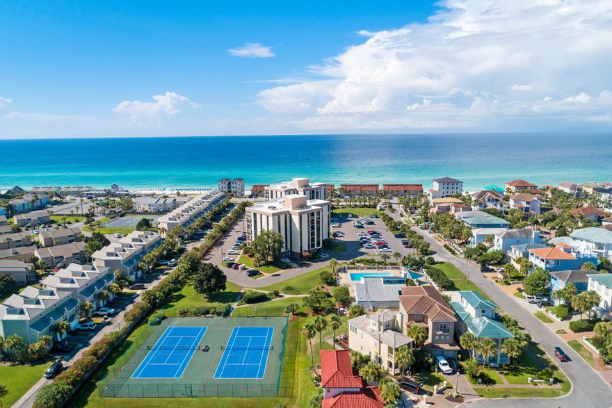 Experience coastal living with this charming 2br, 2ba condo. This meticulously maintained unit offers a serene retreat just steps away from pristine beaches, & convenient to vibrant dining & dining, and endless entertainment options. Step inside to discover a spacious open-concept layout adorned with modern finishes & abundant natural light. The inviting living area provides the perfect space to unwind, with plush furnishings & breathtaking views of the surrounding landscape. The well-appointed kitchen boasts sleek appliances, ample cabinetry. Whether you're hosting a casual brunch or a gourmet dinner, this kitchen is sure to impress. Retreat to the tranquil primary suite, featuring a cozy atmosphere & a private en-suite bathroom for added comfort. Both baths offer upgraded features.