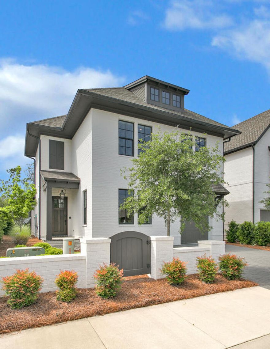 You won't find another like-new home offering the peaceful, gated privacy of the non-rental RidgeWalk community less than one mile from the beach! This beauty has it all - 1st Floor Master with shiplap walls, open concept Living/Dining/Kitchen ideal for entertaining, garage, screened porch, 1st Floor laundry, and a premium lot that backs up to wooded conservation area. Includes designer furnishings/art and all the essentials for relaxing and enjoying the 30A lifestyle - golf-cart, firepit, and Big Green Egg.  Plus the HOA maintains your yard and community pool is across the street. First floor features 10' ceilings, quartz countertops, engineered wood floors, plantation shutters, brick accent wall, wine refrigerator, double oven, farmhouse sink, and upgraded Bosch appliances. Call today!