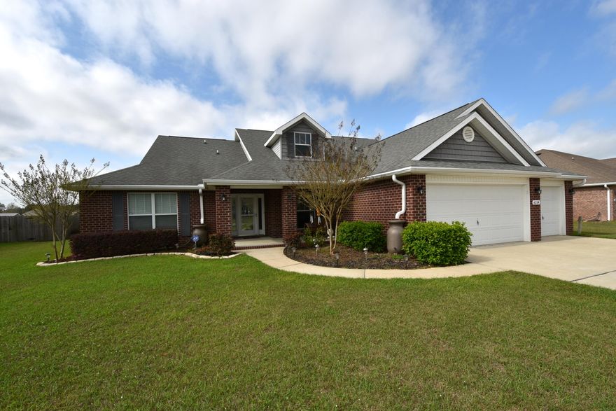 1/2 ACRE, Screened Porch, Workshop, THREE Car GARAGE, 4 Bedrooms, 3 Full Bathrooms, and 3,000+ sq.ft.; Plus 10' ceilings, Granite Kitchen Counters, New Carpet, 24x24 Ceramic Tile, ALL appliances convey to include TWO Fridges, Washer and Dryer! Easy to Buy with a 1 YR home warranty and Closing Costs assistance! Open Floor Plan with a 25x19 Living Room and a separate Den off the Foyer. Chef's Dream Kitchen overlooks the Living Room and has a Breakfast Nook with Bay Window. Kitchen features: Granite Counters, Island, Pantry, Stainless Appliances, Stacked Cabinets, and tons of counter space. Access the Screened Porch from the Living Room, Master Suite, and 2nd Full Bathroom. Private Master Suite has a tray ceiling; Master Bath features: double vanity, 2 Walk-in-closets, Tiled Shower, and Soaker Tub. Bedrooms 2 and 3 off the Kitchen/Breakfast Nook share the 2nd Full Bathroom with access to the screened porch. Cultured Marble Vanities in all the Bathrooms. Bedroom 4 located off the hall from the living/kitchen could be a perfect Guest Suite with the 3rd Full Bathroom. Laundry Room is equipped with the washer, dryer, and Fridge with access to the 3 Car Garage. Great home to enjoy the outdoors with a covered front porch, screened porch, lanai, workshop, and privacy fenced back yard! Schedule your showing today! Closing costs paid by seller are: title insurance, provide existing survey, appraisal, lender charges not to exceed $950, stamps on the deed and mortgage, intangible tax, home warranty of $400. Buyer pays inspections, credit report, prepaid insurance, interest, optional lender charges/origination, points, and escrow set-up.