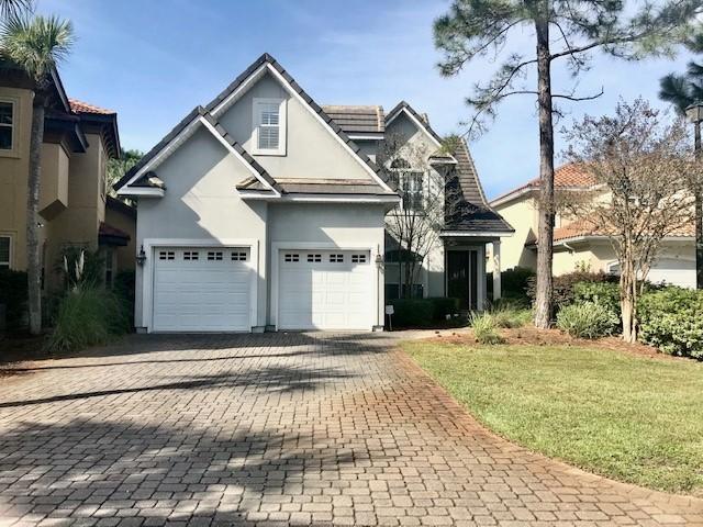 New Paint and Carpet throughout! This beautiful 4BR/2.5BA, unfurnished Destin rental home is located on the 10th green of the Emerald Bay golf course. Enjoy the view from the kitchen which opens to the great room and overlooks a lake teeming with fish. There are stainless steel appliances, a gas stove, and granite counter tops in the kitchen as well as the added touches of crown molding and plantation shutters throughout this Destin rental home. The home has hardwood flooring, tile and new carpet throughout. There is a gas fireplace and an over-sized screened in Florida room perfect for chilly or warm evenings, respectively.There is also a two-car garage and washer/dryer connections. Pets are negotiable with owner approval (sorry, no cats).