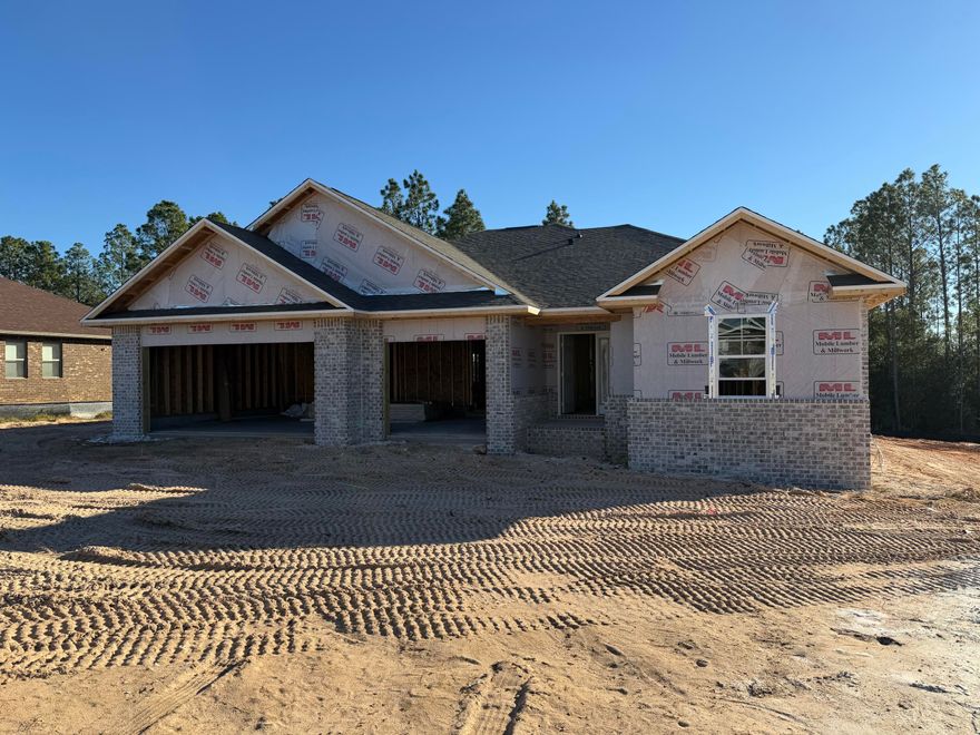 *$15K Your Way on this home which can be allocated towards Interest Rate Buy Down, Closing Costs and/or Prepaid Items (certain restrictions apply) * This Plan Features: 2 x 6 Exterior Construction, 3 CAR GARAGE, 4BR/3BA & Morning Rm, Flex Rm, Dining & Breakfast Cafe * 10 Ft Ceilings & Laminate Wood Plank Flooring in Main Living Areas * Granite Countertops Kitchen & Baths * Tile Flooring in all Baths* Kitchen: Granite Island, Stainless Steel Appliances & Walk In Pantry * Soft Close Cabinetry * Main Suite w/ Trey Ceiling & Main Bath with Builders Signature Zero Entry Walk in Tile shower w/ 2 Shower Heads, Separate Soaking Tub, Double Vanities & Large Walk-in Closets * Ceiling Fans All Bedrooms, Family Rm & Rear Covered Lanai * Irrigation & more.