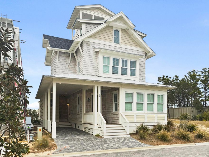 Designed by well-known architect Chris Stoyles of Archiscapes, and impeccably decorated, this 6 bedroom, 5-1/2 bath home offers grand living in the magnificent setting of Grace Point on 30A.Boasting a balanced blend of coastal chic, wood tones, and select fabrics and textures, the layout and flow of the home are both welcoming and timeless for friends and family to enjoy. Upon entry to the residence, the overhead hand-hewn beams will captivate your attention, as you step onto the warm hardwood flooring your eye is drawn to the shiplap & tile clad fireplace creating a dramatic and cozy statement. The gracious great room offers seating for family gatherings and entertaining and the outdoor living becomes seamless with large doors opening to the wide screened in porch.