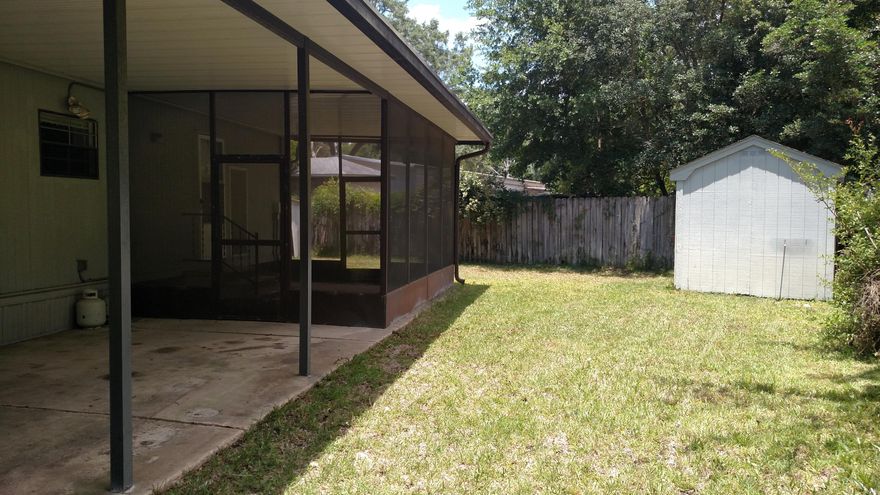 Double Wide Mobile home located in Bayshore Subdivision. Home sits on a large, mature lot. Building needs work. yard buildings on property convey.