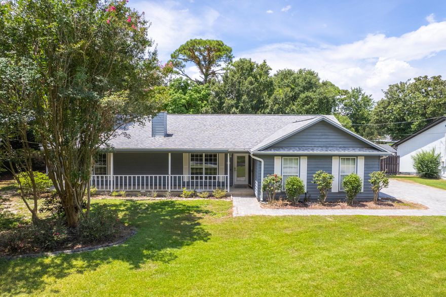 Offered FULLY FURNISHED, this property is move-in ready and an incredible opportunity as either a primary residence or an Airbnb investment! Rental projections are coming in at $39,000 annually.. Located in the sought-after neighborhood of Villa Venyce in the heart of Gulf Breeze, this charming home offers the perfect blend of comfort, style, and convenience. Enjoy access to the neighborhood park, complete with a playground, pavilion, tennis courts, and pickleball courts all while being just moments from top-rated schools. Situated on a shaded corner lot, the curb appeal shines with a paver driveway, mature trees and landscaping, and a welcoming covered front porch. Inside, the open floor plan is enhanced by new luxury vinyl plank flooring throughout and a freshly updated kitchen. The liv ing room boasts vaulted ceilings, skylights, and a striking stone wood-burning fireplace. Updates in the kitchen include newly painted cabinets equipped with new hardware, new appliances, a coastal-inspired backsplash, quartz countertops, an added island, and a new sink! The dining area sits just off the kitchen, with French doors that open directly into the sunroom, creating an easy flow for entertaining. Just off the sunroom are multiple back decks and a hot tub! The split primary suite includes private deck and hot tub access through french doors, plus an en suite bathroom with double vanities, a tub/shower combo, and a large walk-in closet. Two additional bedrooms are located on the opposite side of the home, with a full bathroom in between. One bedroom also opens directly to a 12x16 screened porch, ideal for relaxing in the shade. With its versatile layout, multiple outdoor living areas, and prime location on a quiet street, this home is ready for its next owner to enjoy the best of Gulf Breeze living!