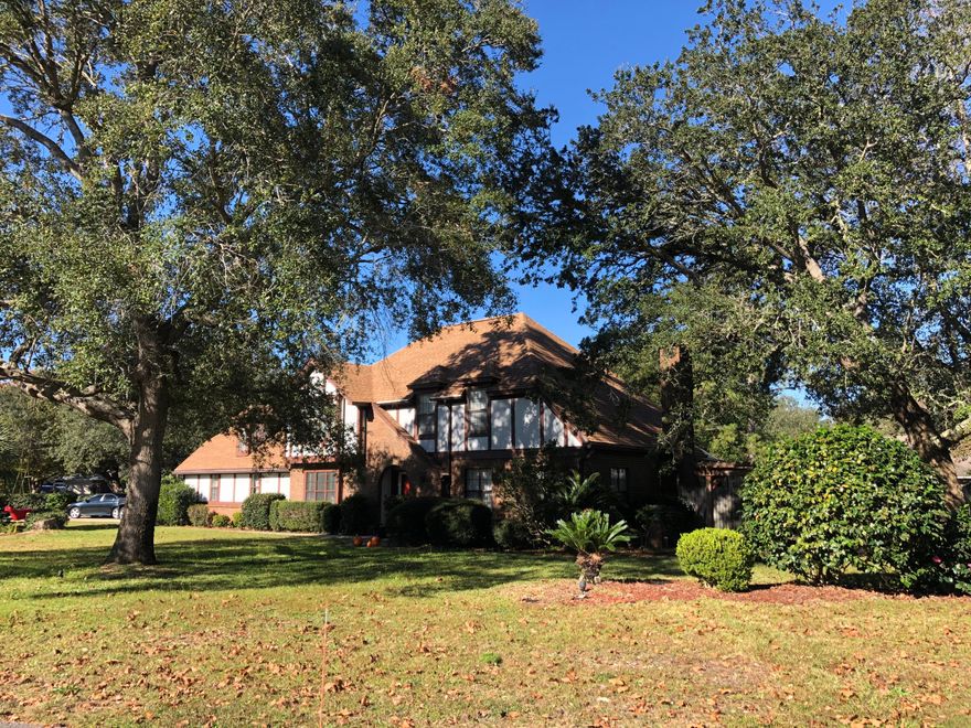 This exclusive Tudor style pool home on nearly half an acre in Raintree Estates is sure to please! You will love the updates in this estate sized home. A gorgeous kitchen that features granite countertops and stainless steel appliances looks out over the screened lanai and pool area. From the foyer, you can turn left into the formal dining room, mount the staircase leading to the second story, or turn right into the large two tiered living area. Upstairs there are three generously sized bedrooms and two full baths. There is also a half bath downstairs for you and your guests convenience. And although the most catching feature about the back yard is the screen enclosure and sparkling pool, you would be remiss not to notice the yard is still big enough to host a friendly soccer game and comes complete with 6' privacy wood fencing and a yard building perfect for storing your lawn equipment. The garage is oversized and will house a long bed truck and for those of you looking for storage, the attic over the garage is floored and has heavy duty metal pull down stairs. The owner is providing pool service with the rent and pets MAY be allowed with prior approval and a $400 pet fee; some restrictions do apply. Apply today!