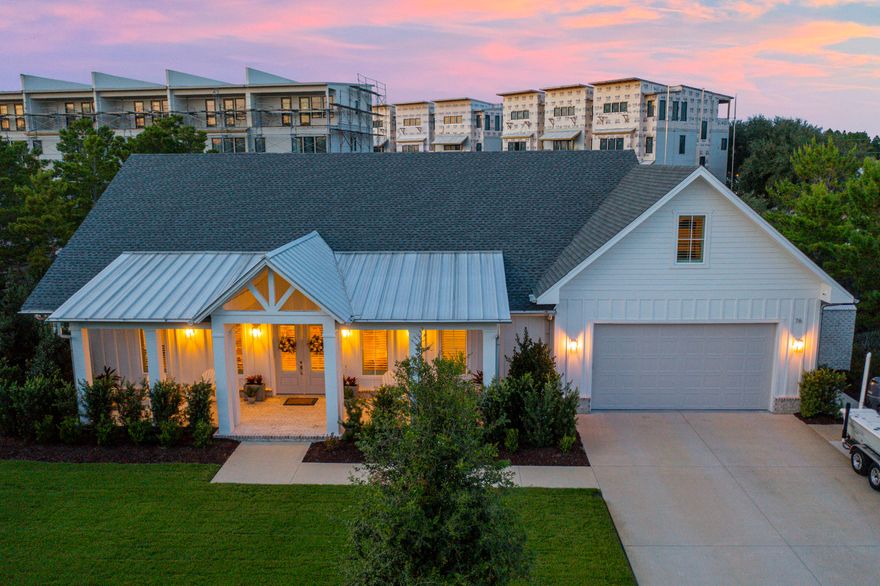 Welcome to 76 Tanglewood, a well-designed two-story home on the West end of 30A. Built in 2022, this five-bedroom, four-bath property offers over 4,000 square feet of living space on a large lot with no HOA and short-term rentals allowed. The open main level includes a bright living area, spacious kitchen, dining space, and  three bedrooms--one can be used as an office. The primary suite overlooks the pool and features a large bath with soaking tub and walk-in shower. Upstairs offers a second living area, two bedrooms, full bath, and bonus room. Outside, enjoy a private pool, covered porch, and a four-car garage - all just minutes from the beach!
