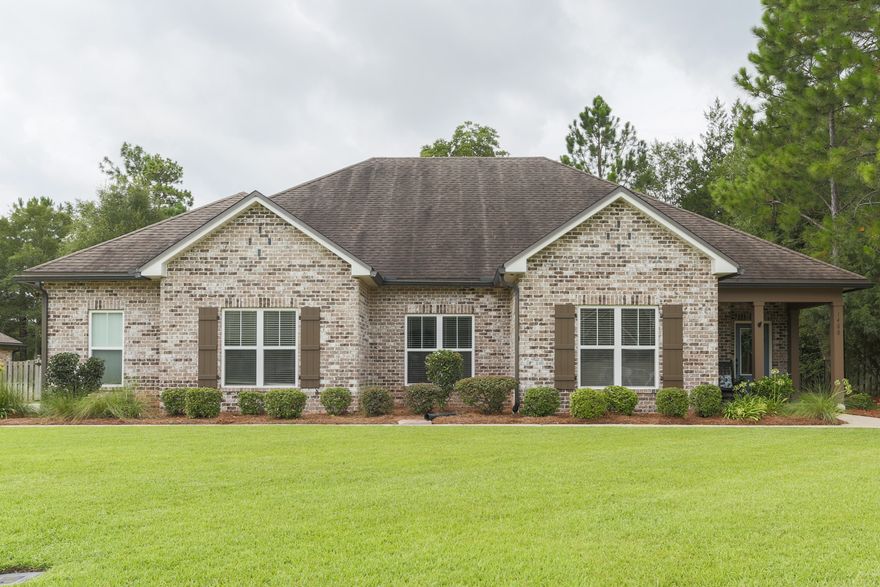 This gorgeous Randy Wise 5 bedrooms, 3 bathroom home sits on .64 acres (fully fenced in flat yard).  The elegant kitchen features granite countertops and stainless steel appliances, new fixtures and bar seating.  The master and 3 additional bedrooms are on the first floor.  Upstairs is the 5th bedroom, perfect for a teen or guest, with a walk in closet and full bathroom.  This home won't last long and is priced to sell!  Take a look TODAY and be sure to check out the virtual tour online!