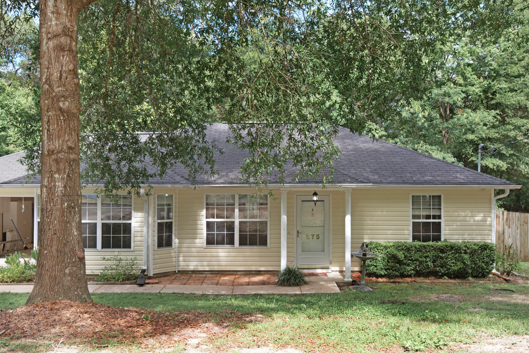 Cute house that feels larger than it is now ready for new owners. Great first time open planned home in quite Crestview neighborhood. When you walk into the home you are welcomed by a towering ceiling and sightlines straight to the back patio through the 328 sq ft great room. There is an electric fireplace in the living room as well as newer laminate wood flooring. The master suite boasts a large walk in closet and is located across the home from the other two bedrooms. The two good size bedrooms share a bathroom and have large closets. Enjoy evenings in the shady backyard on your large deck. The one car garage is insulated to help maintain temperature. HVAC is 2 years old, the interior is freshly painted and carpets will be installed prior to closing.