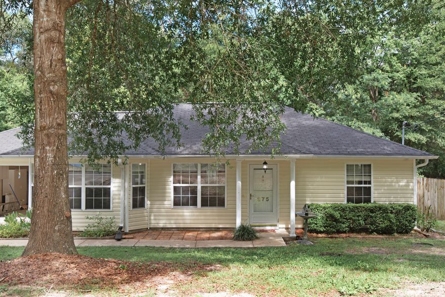 Cute house that feels larger than it is now ready for new owners.  Great first time open planned home in quite Crestview neighborhood.  When you walk into the home you are welcomed by a towering ceiling and sightlines straight to the back patio through the 328 sq ft great room.  There is an electric fireplace in the living room as well as newer laminate wood flooring.  The master suite boasts a large walk in closet and is located across the home from the other two bedrooms.  The two good size bedrooms share a bathroom and have large closets.  Enjoy evenings in the shady backyard on your large deck.  The one car garage is insulated to help maintain temperature. HVAC is 2 years old, the interior is freshly painted and carpets will be installed prior to closing.