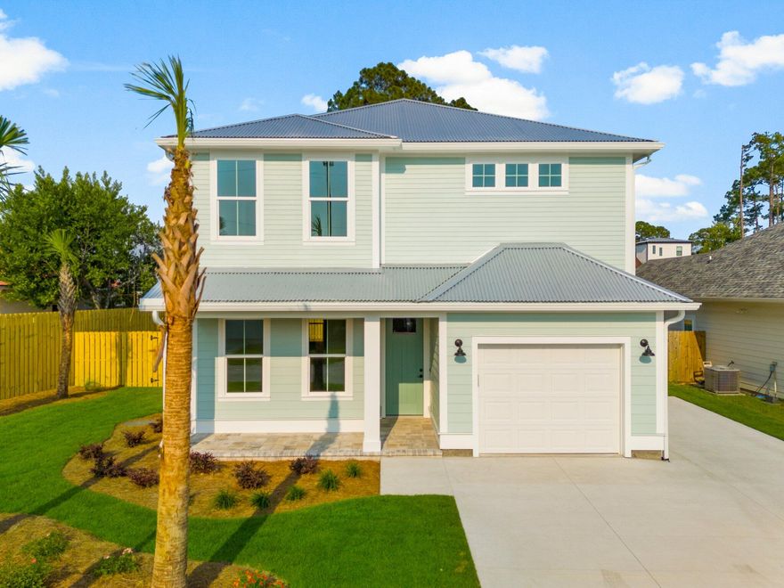 Welcome to your brand new beach house at 328 Palm Beach Drive, Panama City Beach! Located in Inlet Beach Heights a golf cart friendly community. This stunning new construction property is situated walking distance to the gorgeous white sand beaches of the Gulf of Mexico, making it the perfect beach getaway for you and your family. With 4 spacious bedrooms and 4.5 bathrooms, this property offers plenty of room for everyone. The FLEX SPACE located on the second floor offers the flexibility to use it as a secondary living room or a bunk room for additional guests, while the single car garage provides ample space for your vehicle/golf cart and storing your beach gear while the driveway holds 6 vehicles. This property has been designed with your comfort and convenience in mind. The open concept living area boasts high ceilings, modern fixtures, and plenty of natural light, making it the perfect space for entertaining guests or relaxing with your loved ones. The beach house features tasteful finishes throughout, including a fully equipped kitchen with stainless steel appliances and quartz countertops, 9 foot ceilings and 8 foot doors. The property's location is unbeatable, as it is just a short walk from the beach and is situated in a prime location for local shopping, dining, and entertainment. And with its fantastic six figure short term rental potential, this property is an excellent investment opportunity for those looking to generate rental income. In addition to its stunning design and prime location, this beach house also boasts an incredible backyard oasis. The heated swimming pool provide the perfect opportunity to relax and unwind after a day spent on the beach or exploring the local area. The backyard is fully fenced, offering both privacy and security, making it the perfect space for children and pets to play. With ample space for outdoor dining and lounging, you can enjoy the Florida sunshine and warm ocean breeze from the comfort of your own backyard. Whether you're looking to entertain guests or simply enjoy a relaxing evening at home, this backyard oasis is sure to impress. Don't miss your chance to own this stunning beach house with its own private pool. Schedule a showing today and experience the luxury and convenience of this incredible property! Disclosure: Confirm with your real estate professional for final details.
