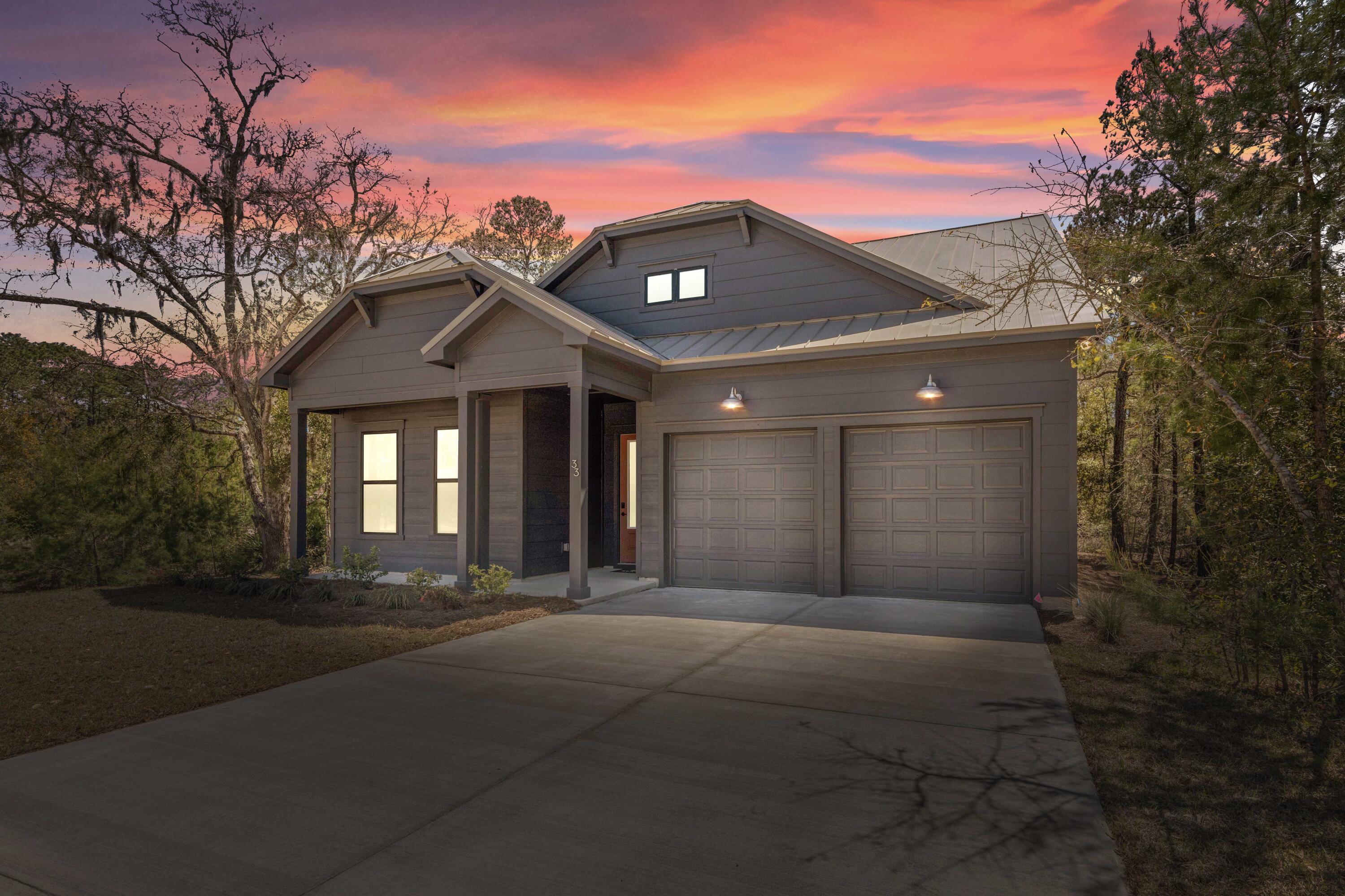 Welcome to The Shoal, a brand-new neighborhood where tranquility meets convenience. Nestled on the fringes of the expansive Point Washington State Park, this community boasts 30 thoughtfully designed homesites, each strategically laid out to provide residents with a sense of privacy and a connection to nature. The Shoal is conveniently located a short drive to Seaside, Grayton Beach and 30a. These spacious homes are designed to harmonize with the unique esthetics of the area boasting earthy tones, a community pond, and half of the lots backing up to state park. The Venice floor plan offers 4 bedrooms and 3 baths with an open living concept and sunroom downstairs and a spacious loft area upstairs. . *** These are pictures of the same model but not the exact house for lot 19.*** This home comes with amazing standard features such as a sunroom, metal roof, impact windows/doors, quartz countertops, LVP floors throughout all of the common areas/bedrooms, 8 ft doors downstairs, and a gas range and vented hood in the kitchen just to name a few! Homeowners have the ability to choose their finishes and upgrades at their design appointment. **Prices may vary based on upgrades and lot selection. This listing shows the base price of this home with lot premium included. Photos are of this floor plan, but not this exact home. Check out our virtual tour of the Venice!**