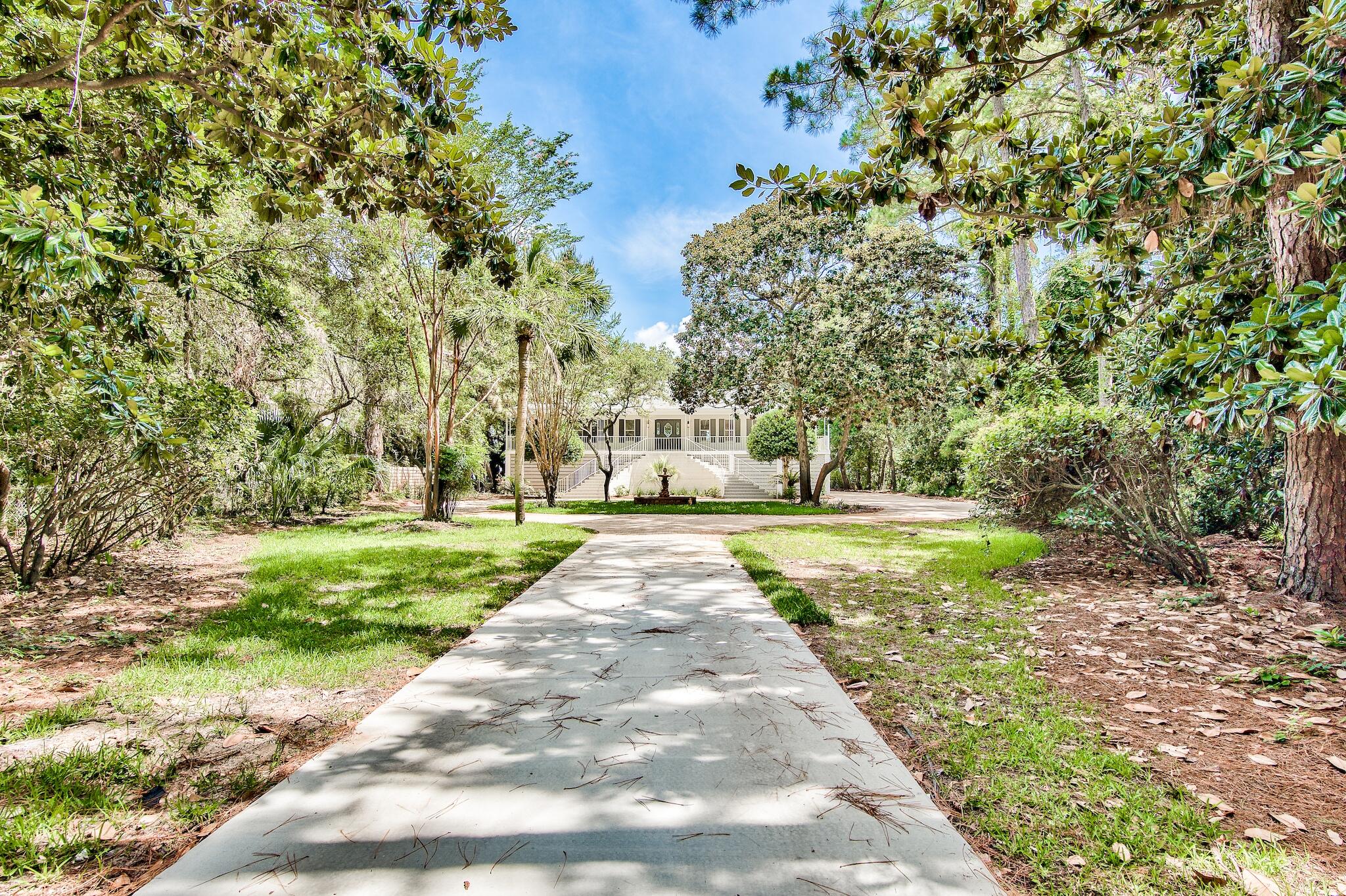 Currently under contract wtih kick-out clause Located in the heart of Destin this renovation rivals any HGTV reality show! Decked out with 5 bedrooms/4 baths this estate is ready for a new family. This home sits on over one acre with 100+ feet of waterfront on Choctawatchee Bay making it great for all boat lovers! Century old pine trees and lush foliage provide lots of privacy. A rare diving pool, hot tub, pool side snack bar and a 900 sq. ft. dock with both a boat and jet ski lift offer you the best of bay side living. A notable feature of this property is that it sits 'high and dry' and does not require flood insurance.