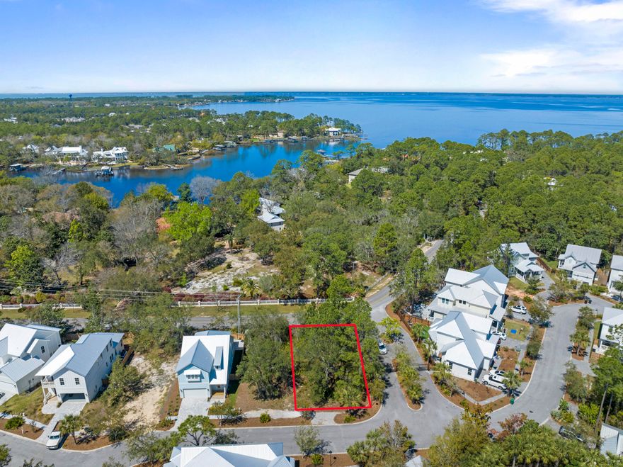 Great flat, buildable lot located in the lovely gated community of Hidden Grove. Bordered by Point Washington State Forest and featuring a charming community pool and Florida Cottage style construction, this quaint little hidden gem of a neighborhood is great for full time living with quick access to many nearby shops, restaurants as well as the beautiful beach of South Walton on 30a!  You'll appreciate  being so close to everyday conveniences such as Publix, Grand Boulevard Shopping Center, Sandestin Resort, Silver Sands Outlet Malls, Walmart, Sacred Heart Hospital and so much more.