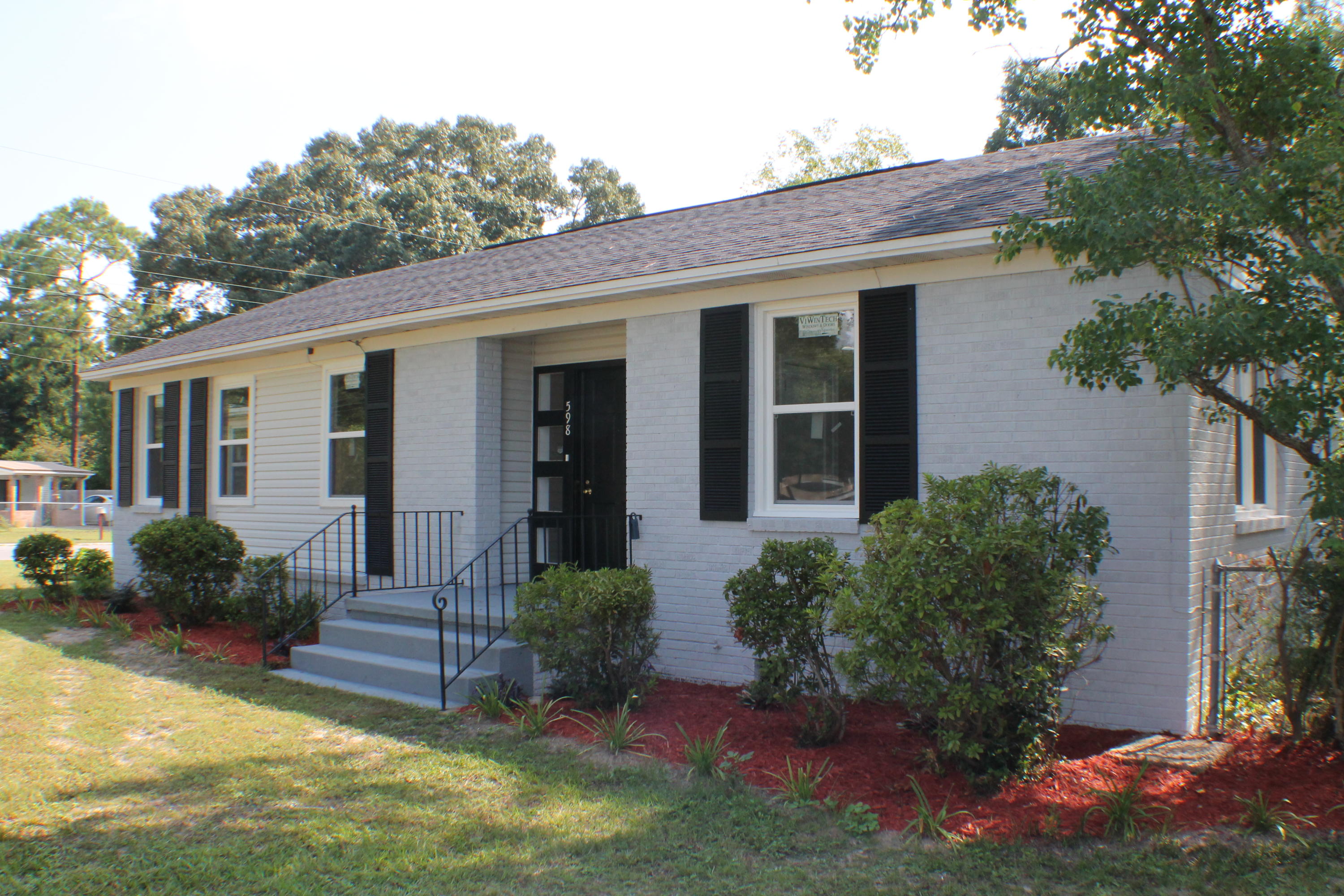 REO - AS-IS...Complete Restoration! Wow! New roof, New paint, New bathrooms, New kitchen, New Windows! New A/C! Completely remodeled!! Wow, Beautiful Hardwood Floors! Custom Cabinets old style with new design! The detached efficiency apartment over the carport could be a great rental income or studio office! You have to see this beautiful home to appreciate it! Come see home sweet home today!